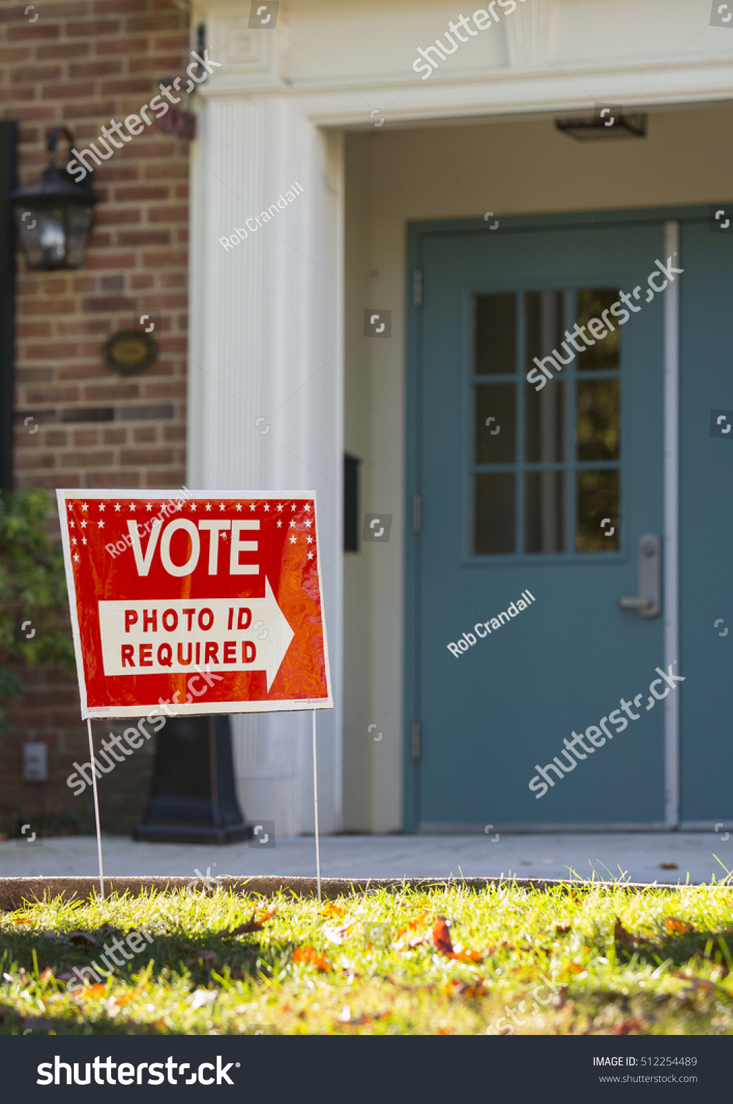 ARLINGTON, VIRGINIA, USA - NOVEMBER 8, 2016: Vote sign on presidential election day. Photo ID Required in Virginia. #512254489