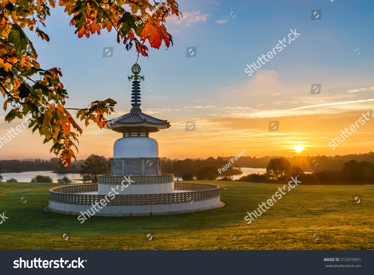 Peace Pagoda temple at sunrise in Willen Park, Milton Keynes, UK #512319931
