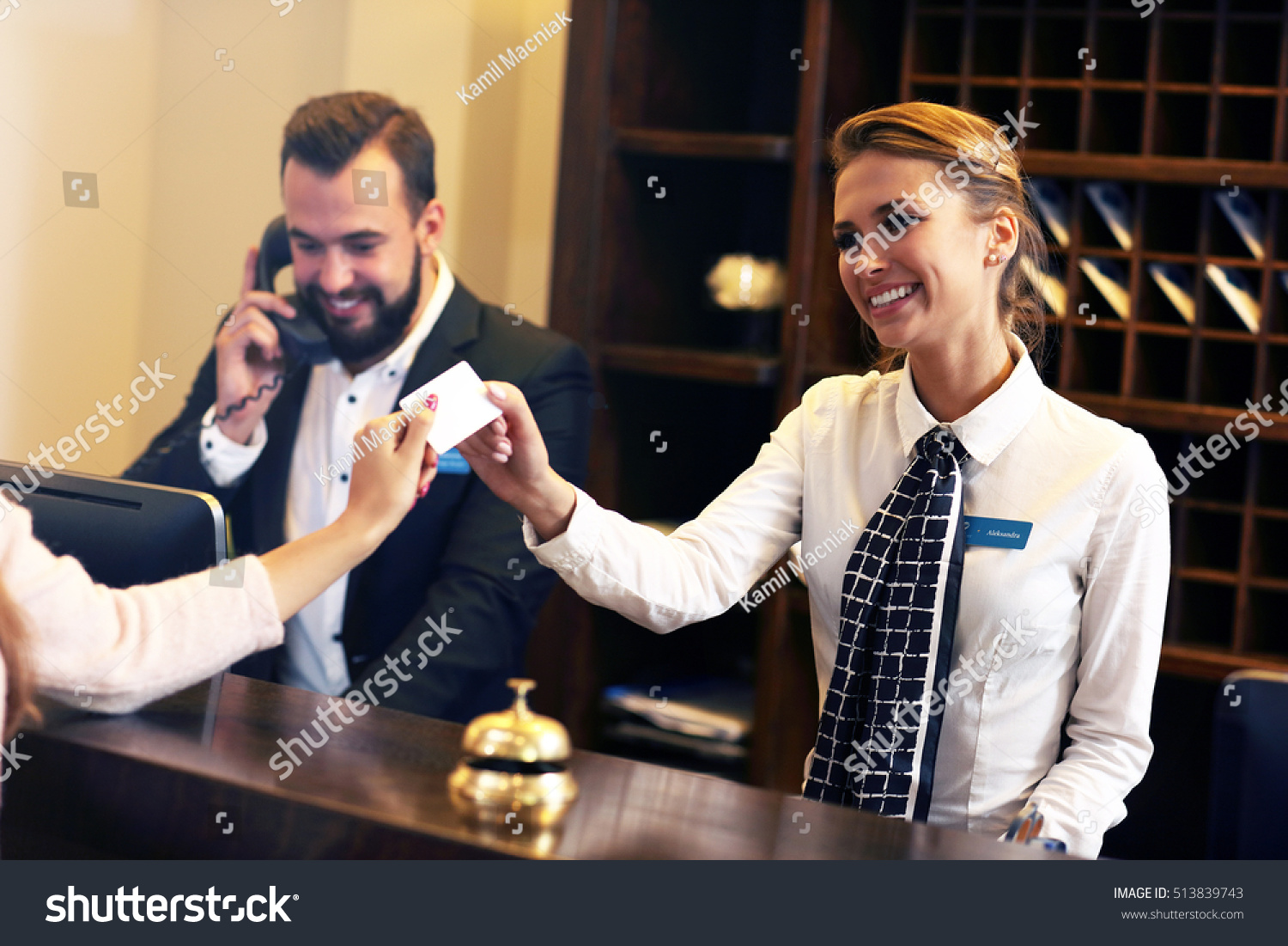 Picture of guests getting key card in hotel #513839743