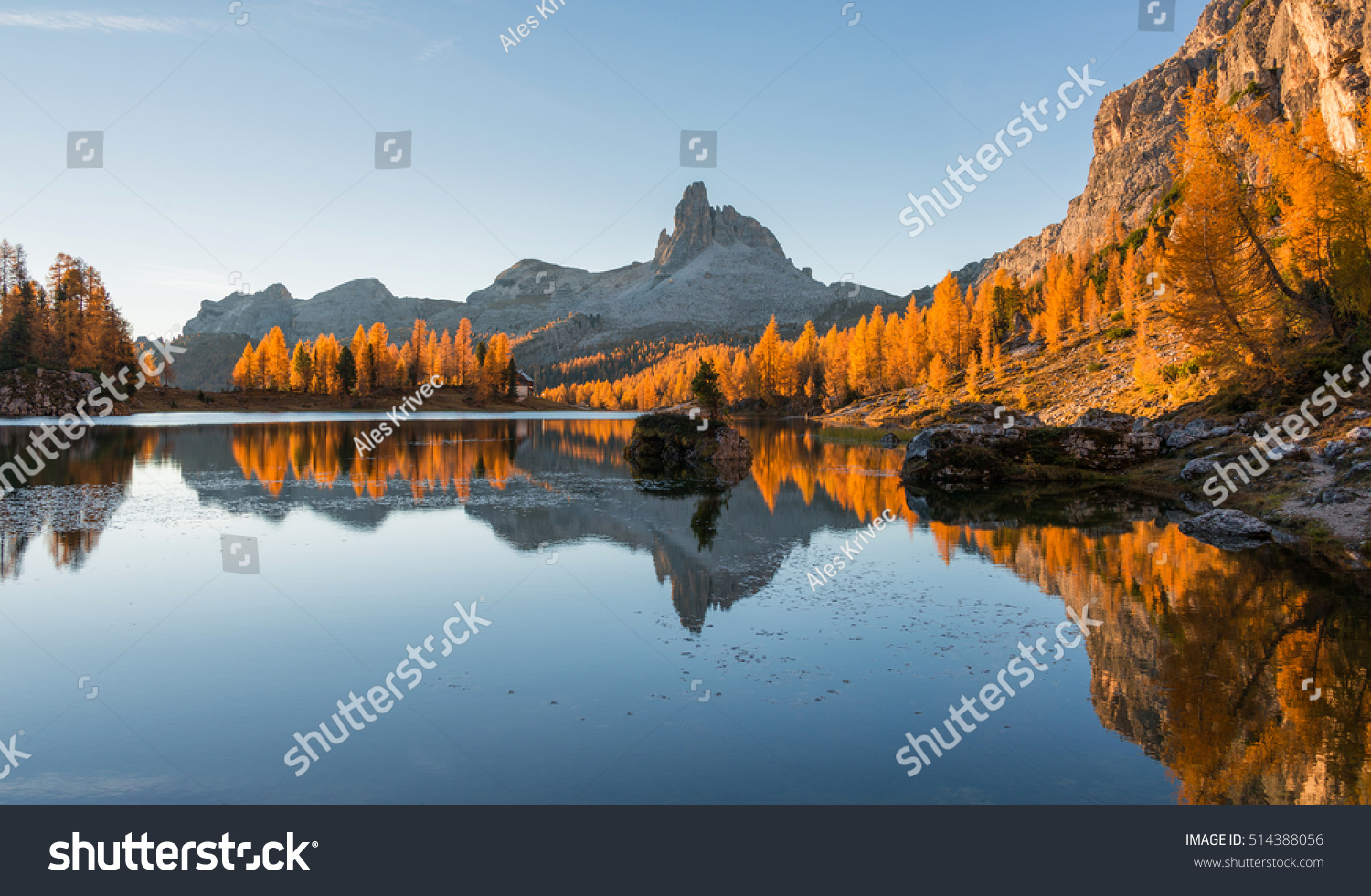 Amazing autumn scenery in the Dolomites mountains at Lake Federa. #514388056