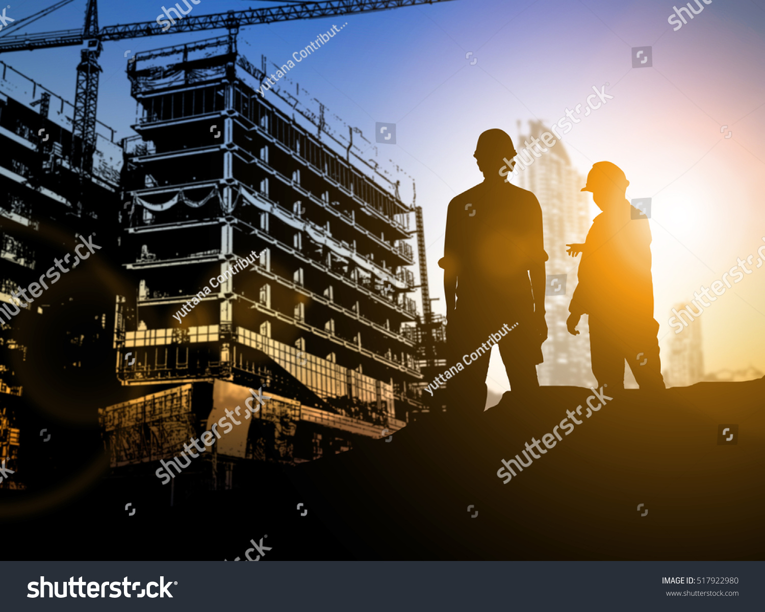 silhouette Businessman engineer looking blueprint in a building site over Blurred construction site film grain progress and potential personal and career growth concepts. #517922980