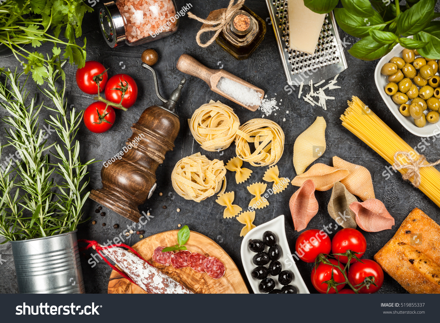 Italian food ingredients with pasta and herbs #519855337
