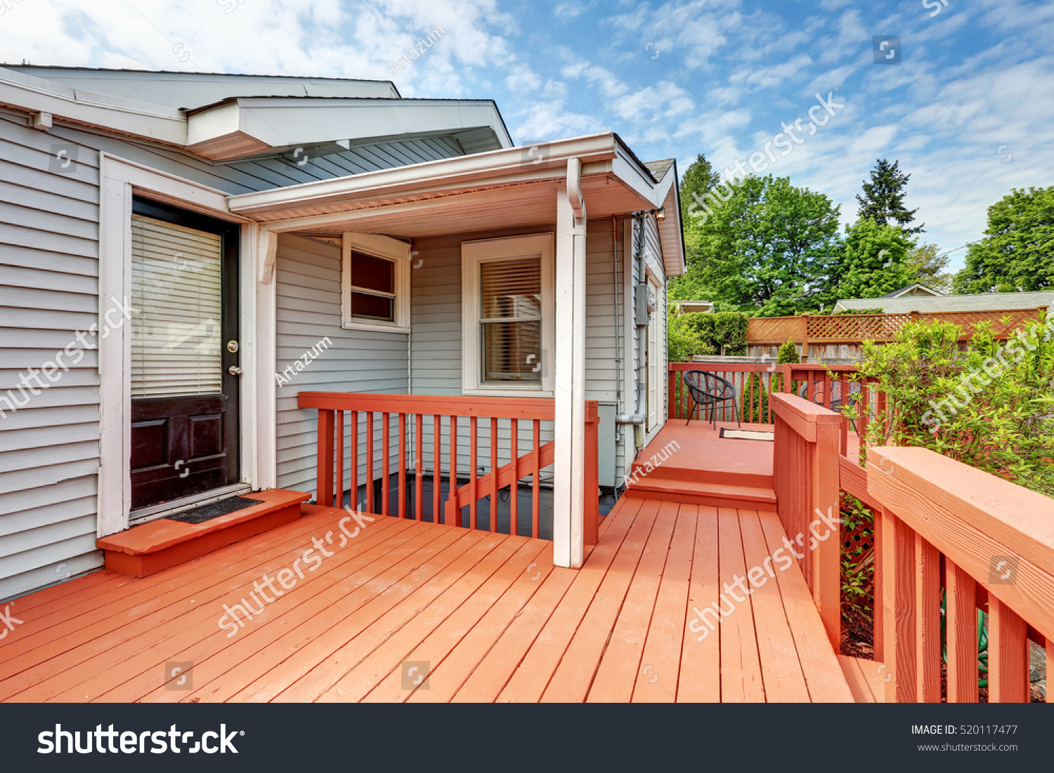 Backyard of craftsman home with red deck. Northwest, USA  #520117477