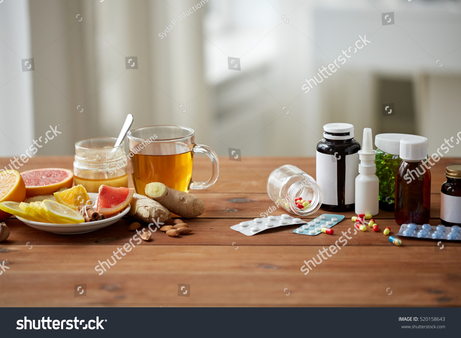 health, traditional medicine and ethnoscience concept - natural and synthetic drugs on wooden table #520158643