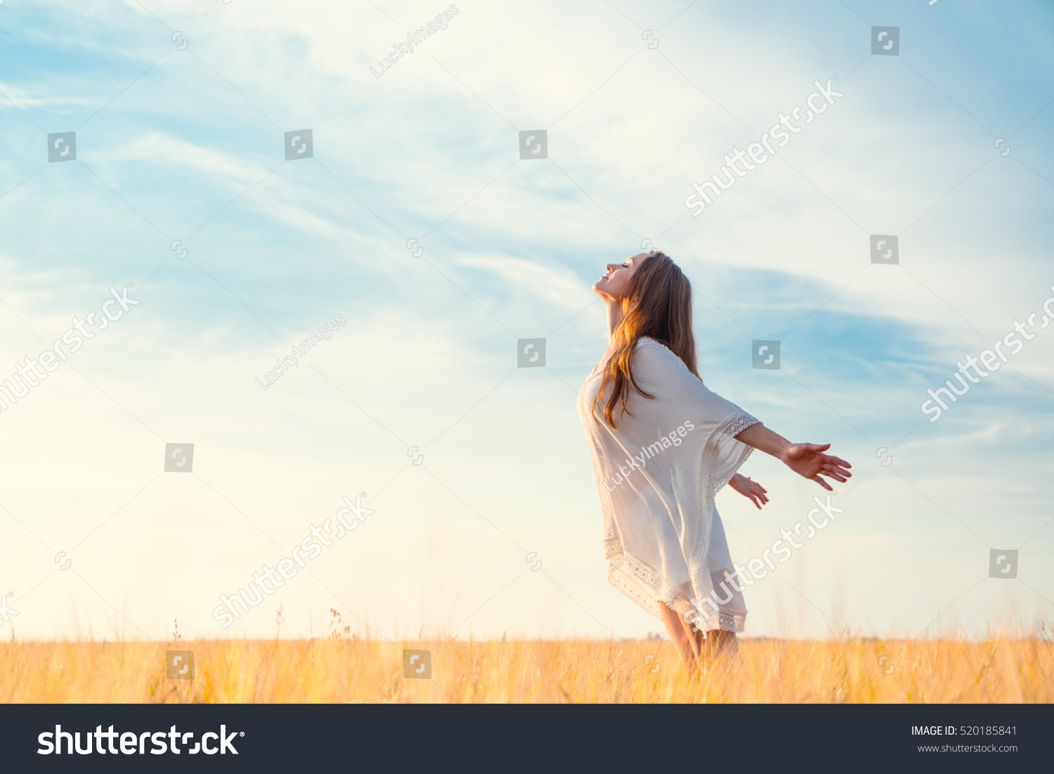 Young girl in a field #520185841