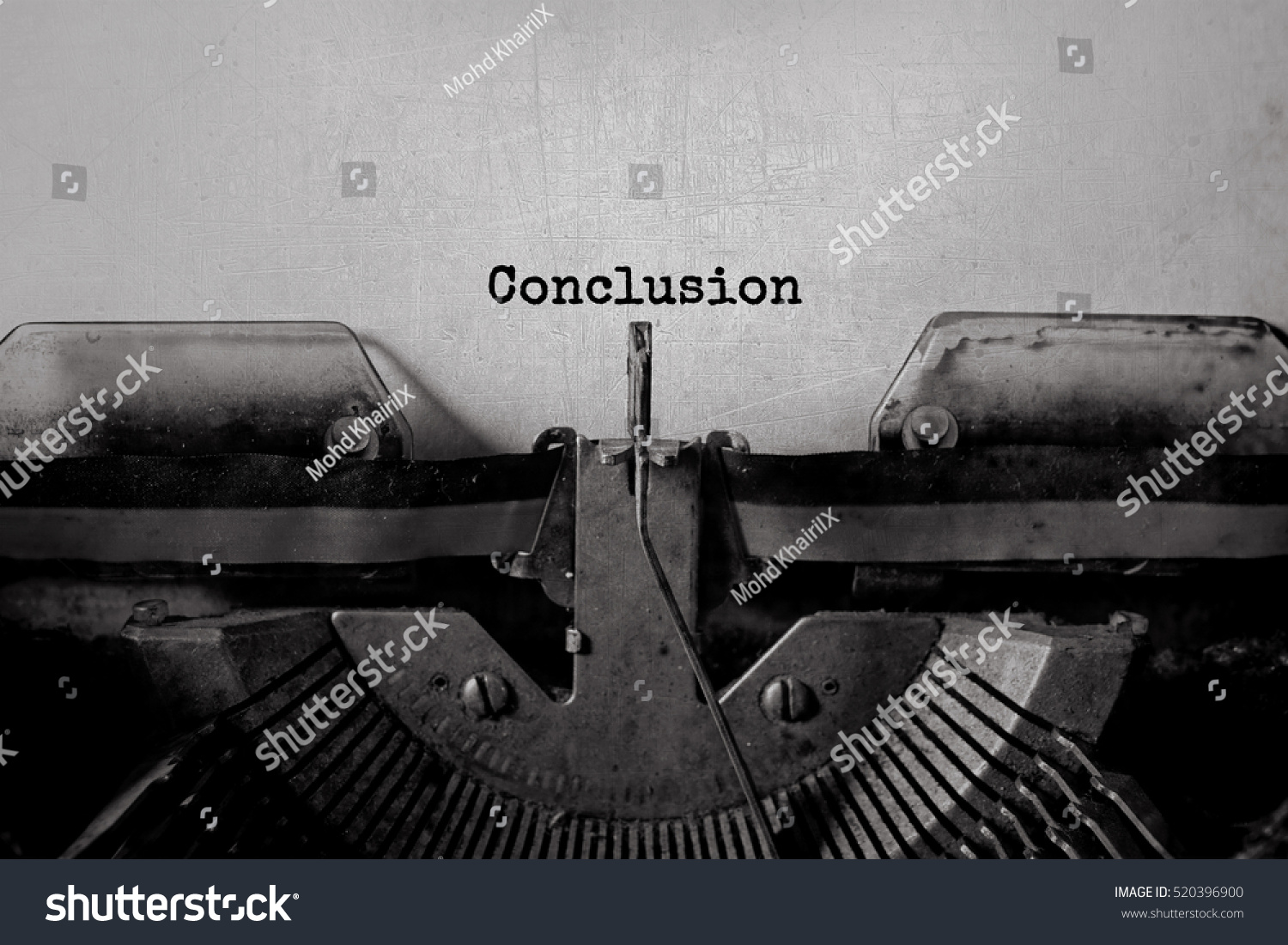 Conclusion typed words on a Vintage Typewriter.  #520396900