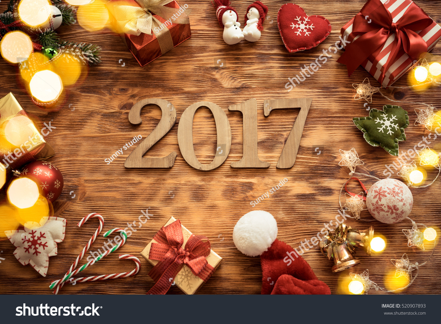Christmas tree decorations on wooden table. Xmas New Year Holiday concept. Numbers 2017 #520907893
