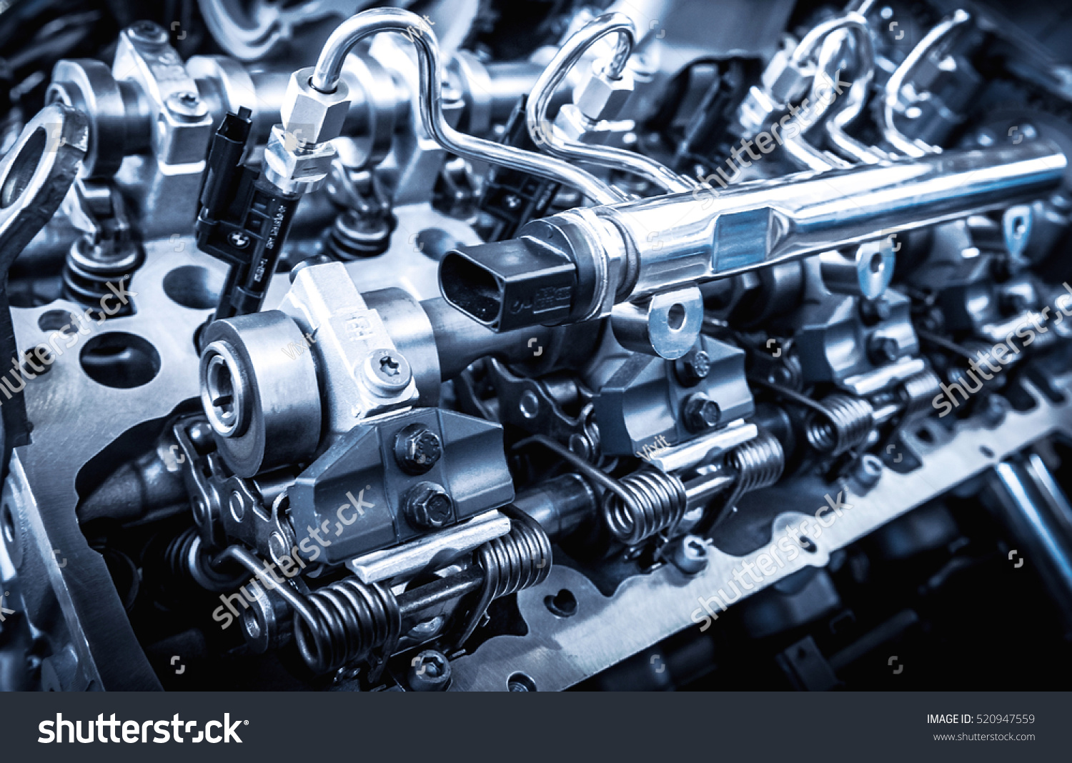 The powerful engine of a car. Internal design of engine. Car engine part. Modern powerful car engine. #520947559