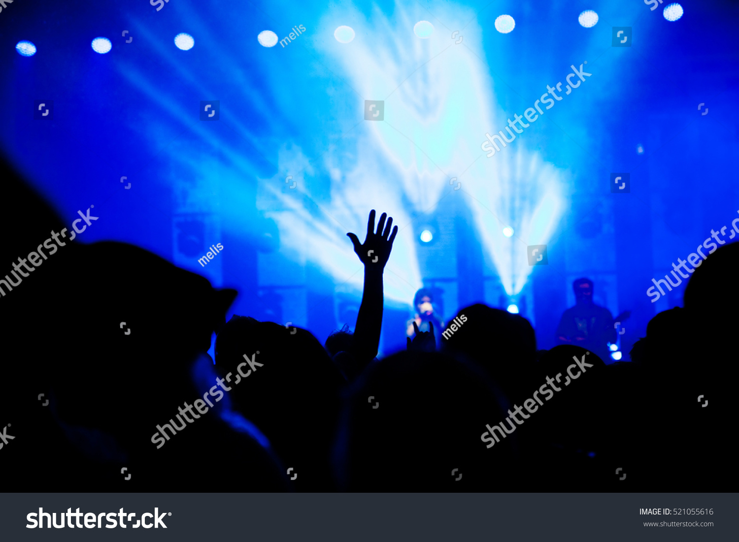 crowd at concert and bright stage lights #521055616