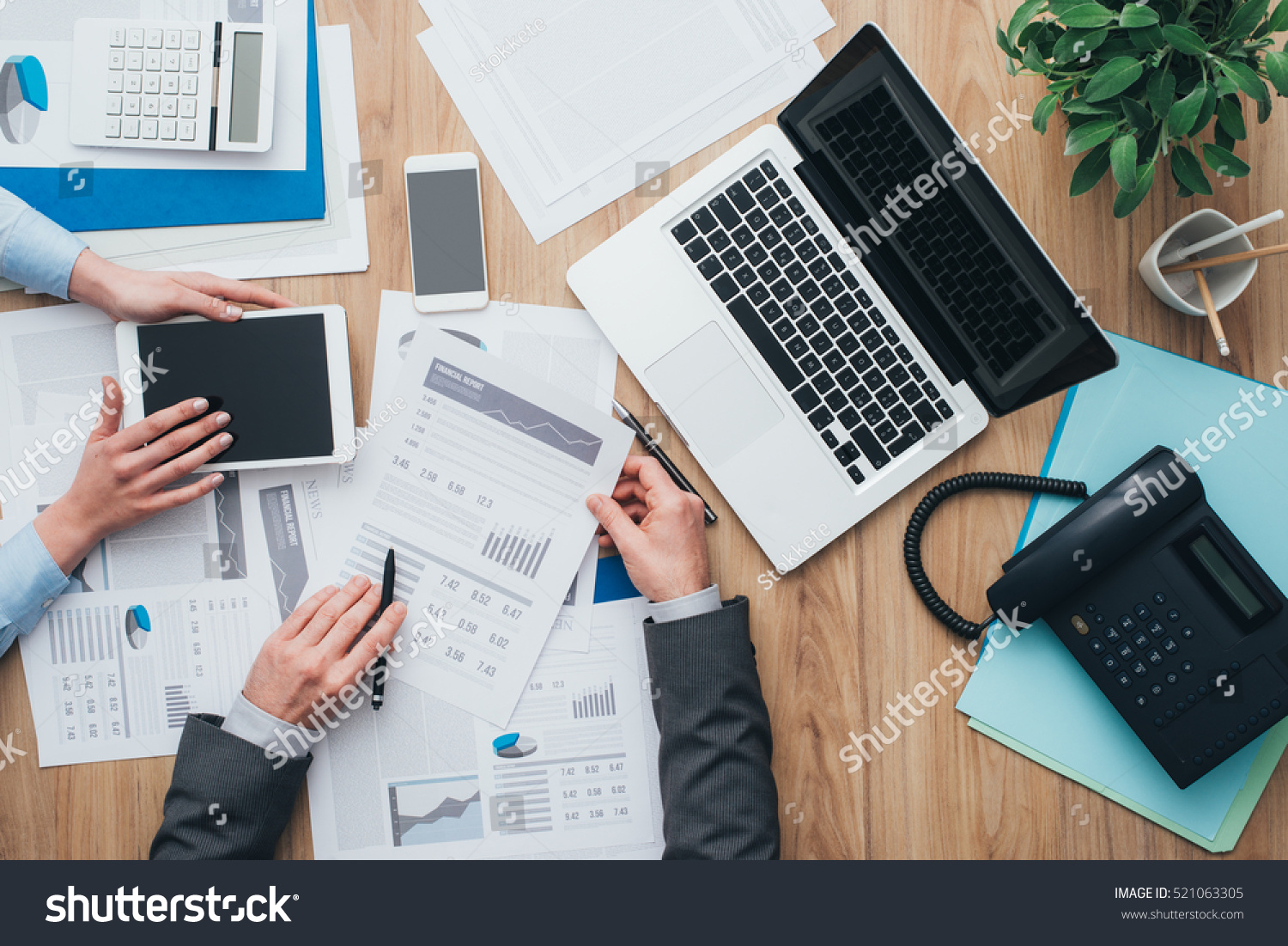 Business team working at office desk and analyzing financial reports, finance and accounting concept, top view #521063305