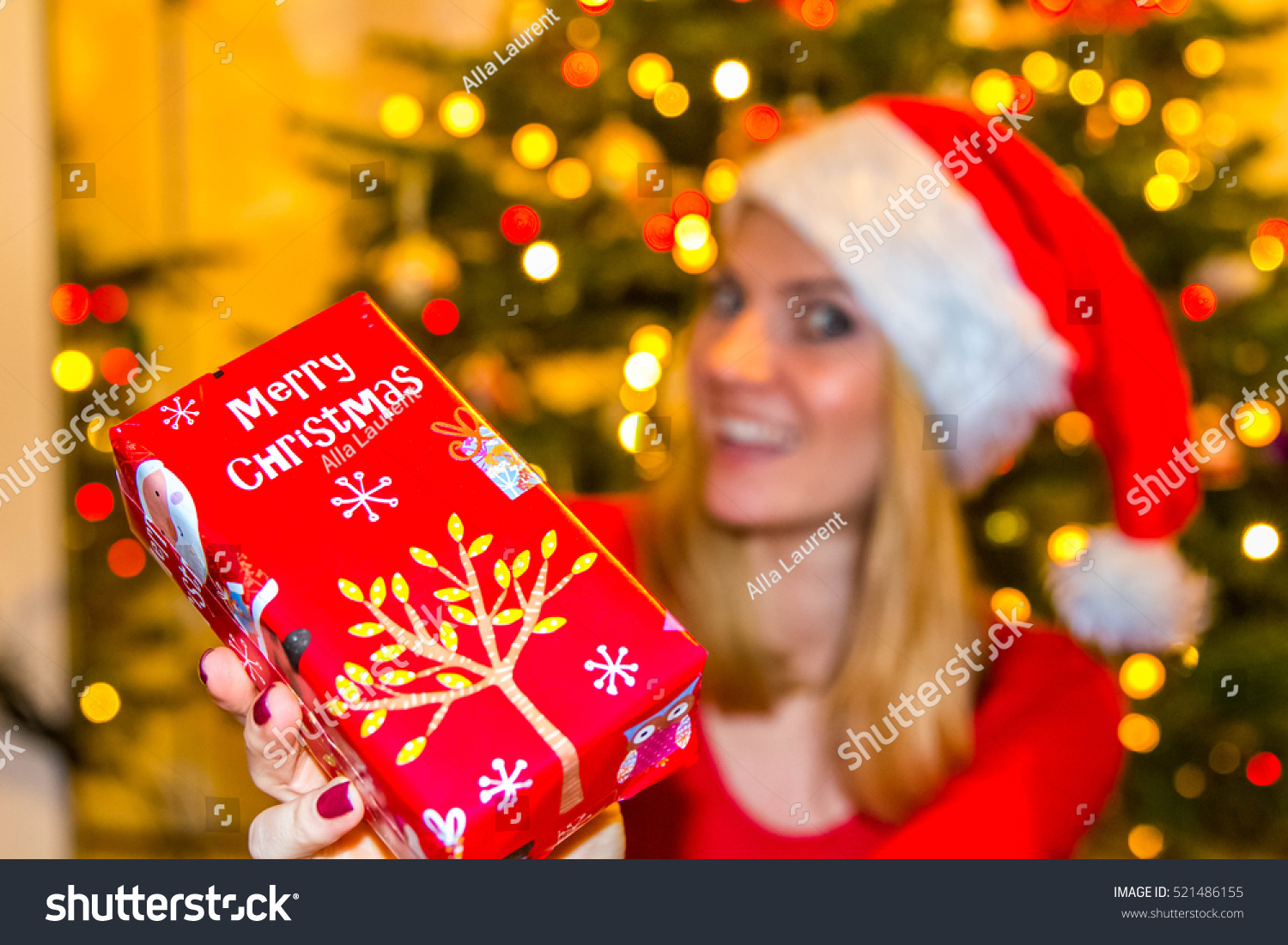 Christmas presents, woman holds presents #521486155