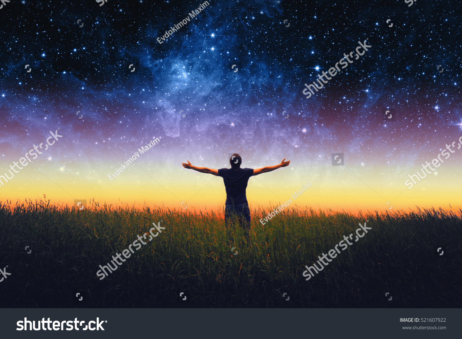 Silhouette of man and stars sky. Elements of this image furnished by NASA #521607922