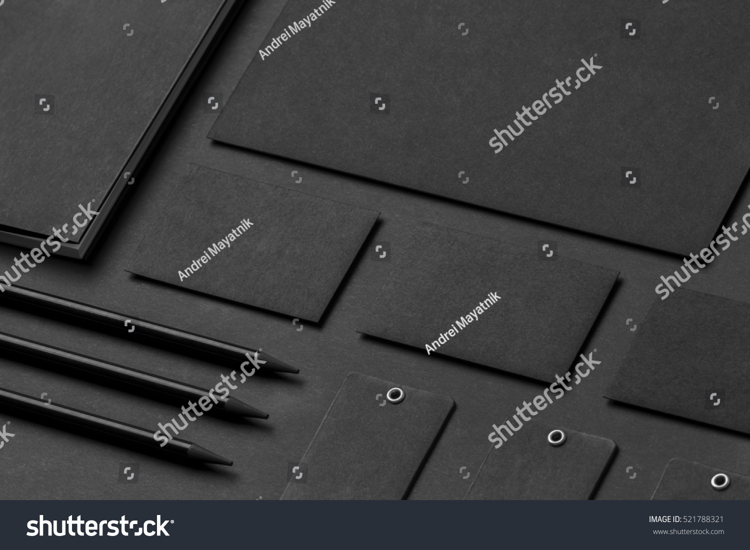 Brand identity mockup. Blank corporate stationery set at black textured paper background. #521788321