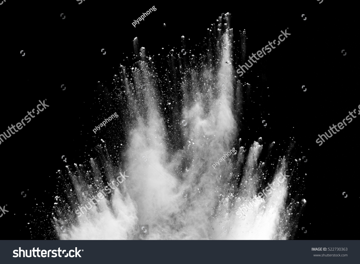 Launched white powder, isolated on black background #522730363