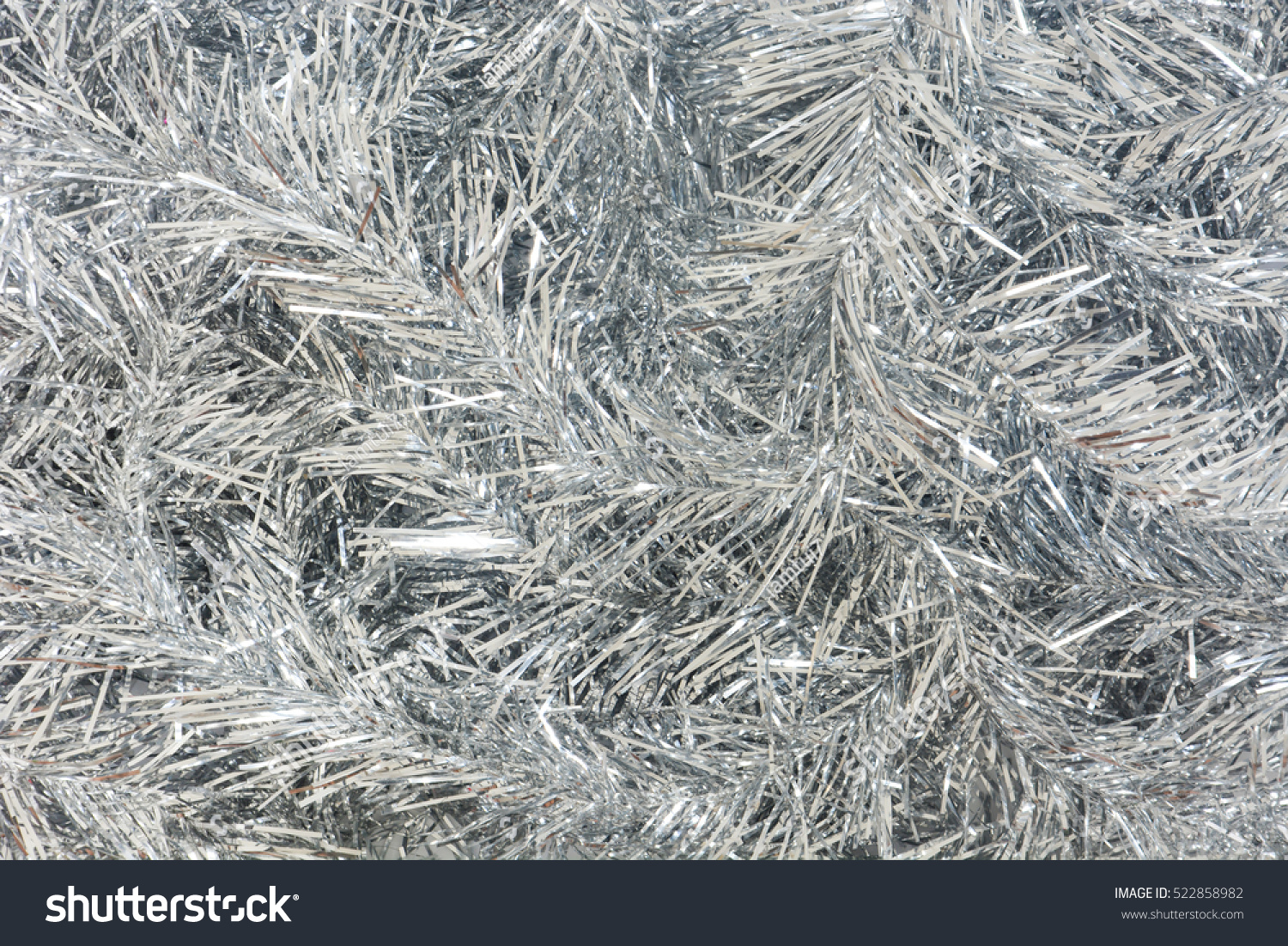 silver Christmas tinsel for background  #522858982