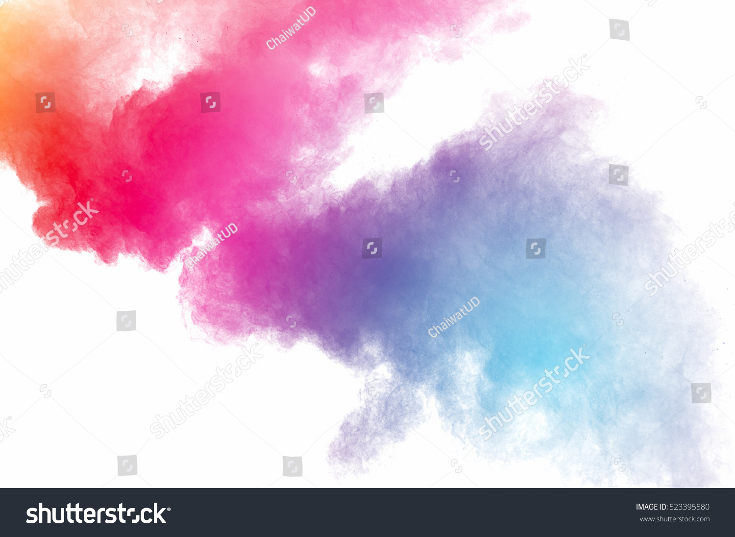 Abstract art powder paint on white background. Movement abstract frozen dust explosion multicolored on white background. Stop the movement of colored powder on white background. #523395580