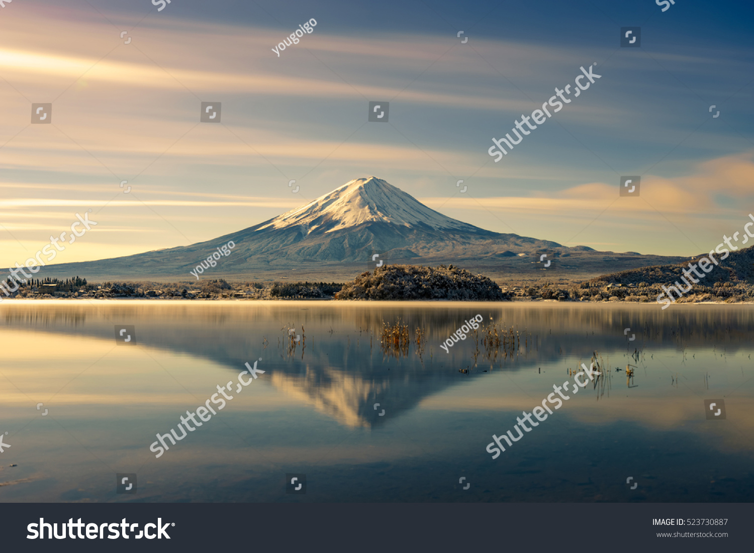 Mt Fuji reflection on water.Fujisan mountain sunrise landscape.Fuji mountain at lake Kawaguchiko and snow landscape.Japan autumn season #523730887