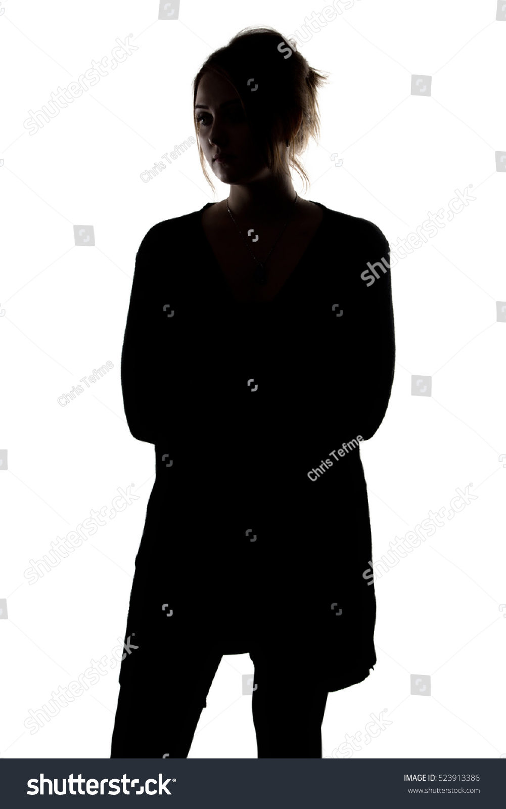Silhouette of woman in cardigan #523913386