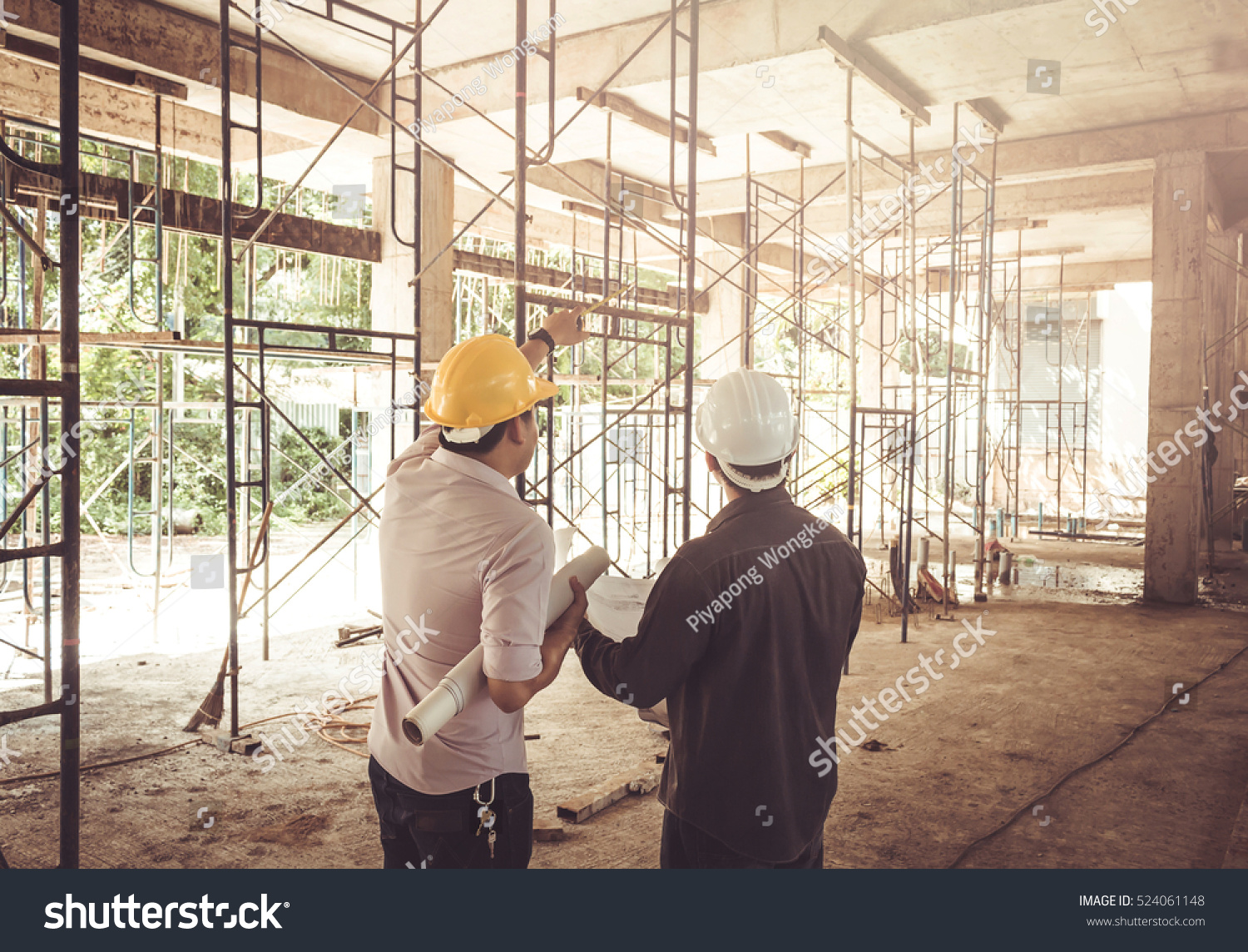 two business man construction site engineer, effect Vintage sun flare #524061148