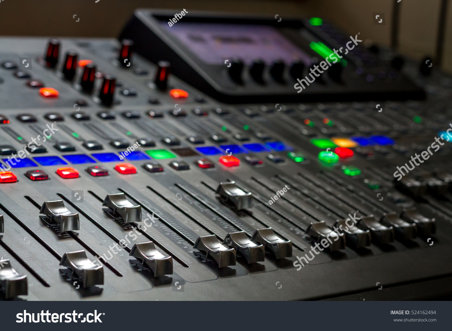 The audio equipment, control panel of digital studio mixer. Close-up, selected focus #524162494