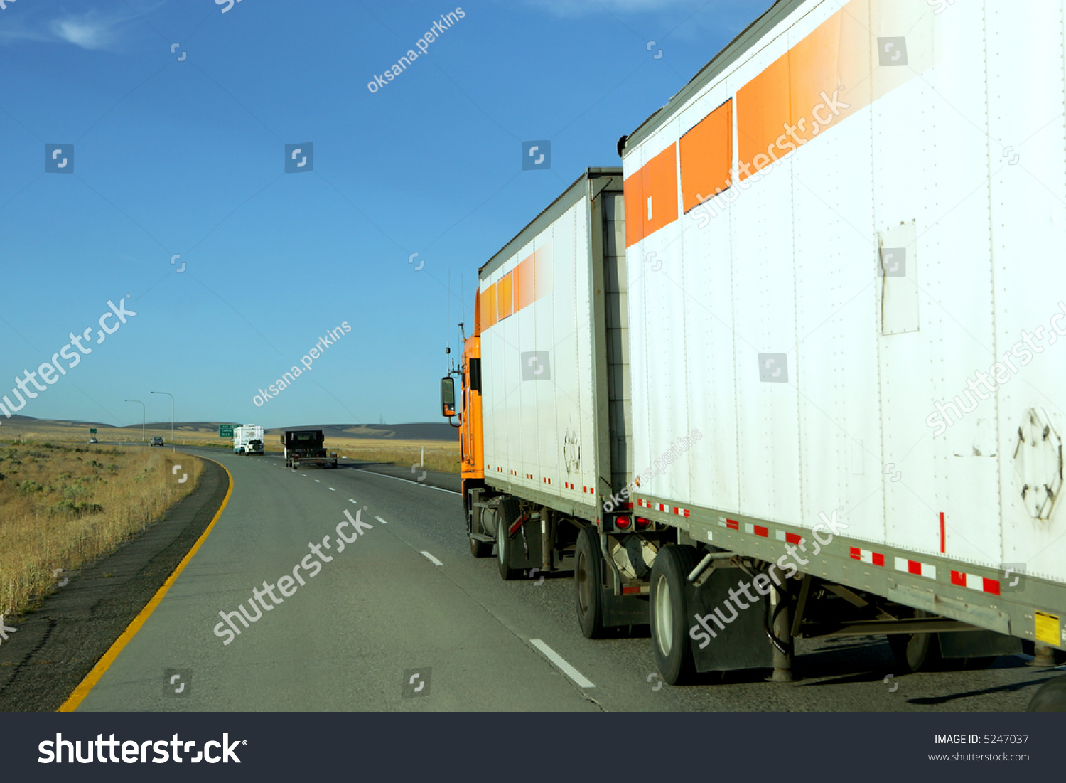 Semi truck going fast on interstate highway #5247037