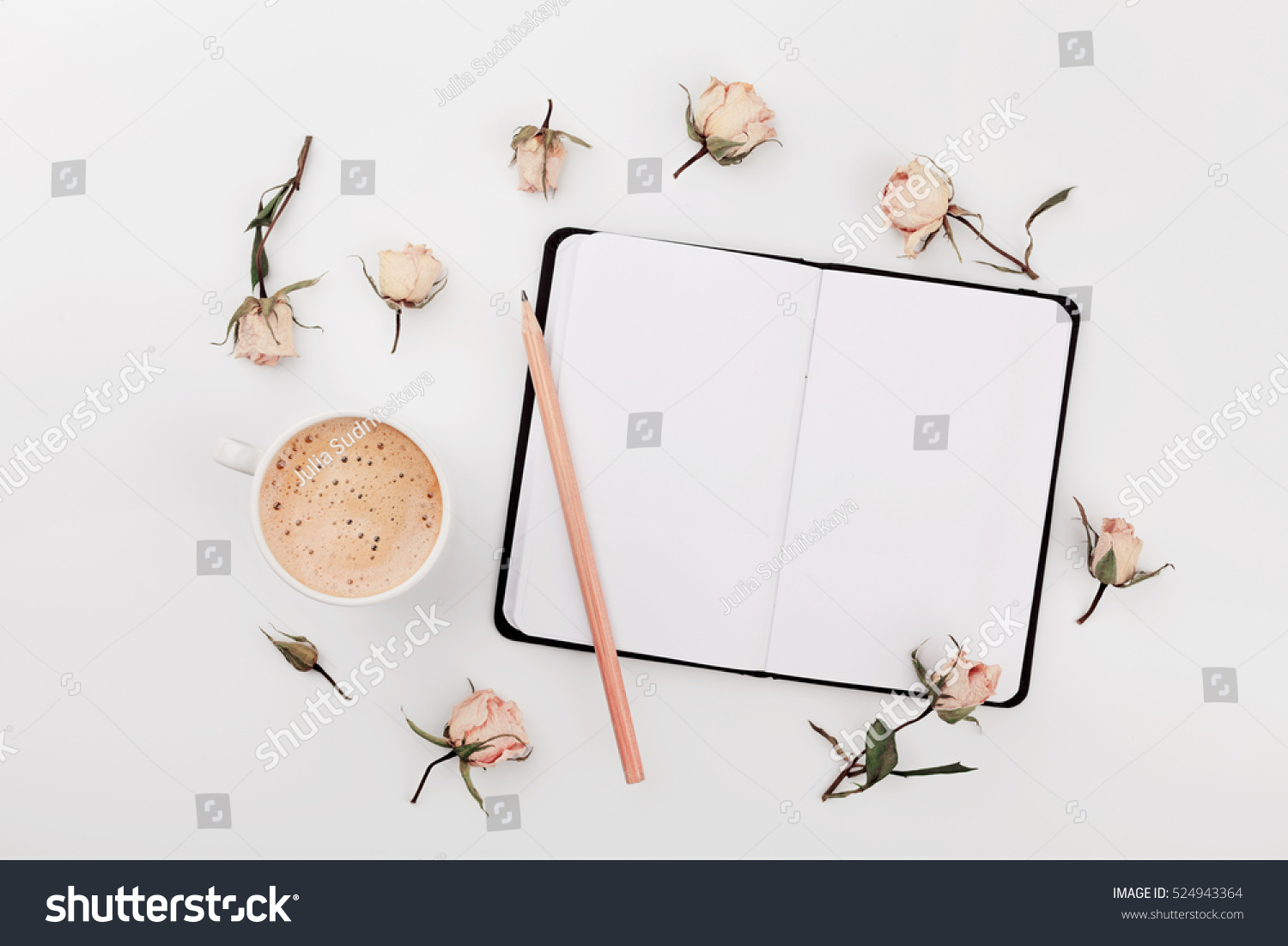 Morning Cup of coffee, empty notebook and dry roses flowers on white table from above. Cozy Breakfast. Flat lay style. #524943364