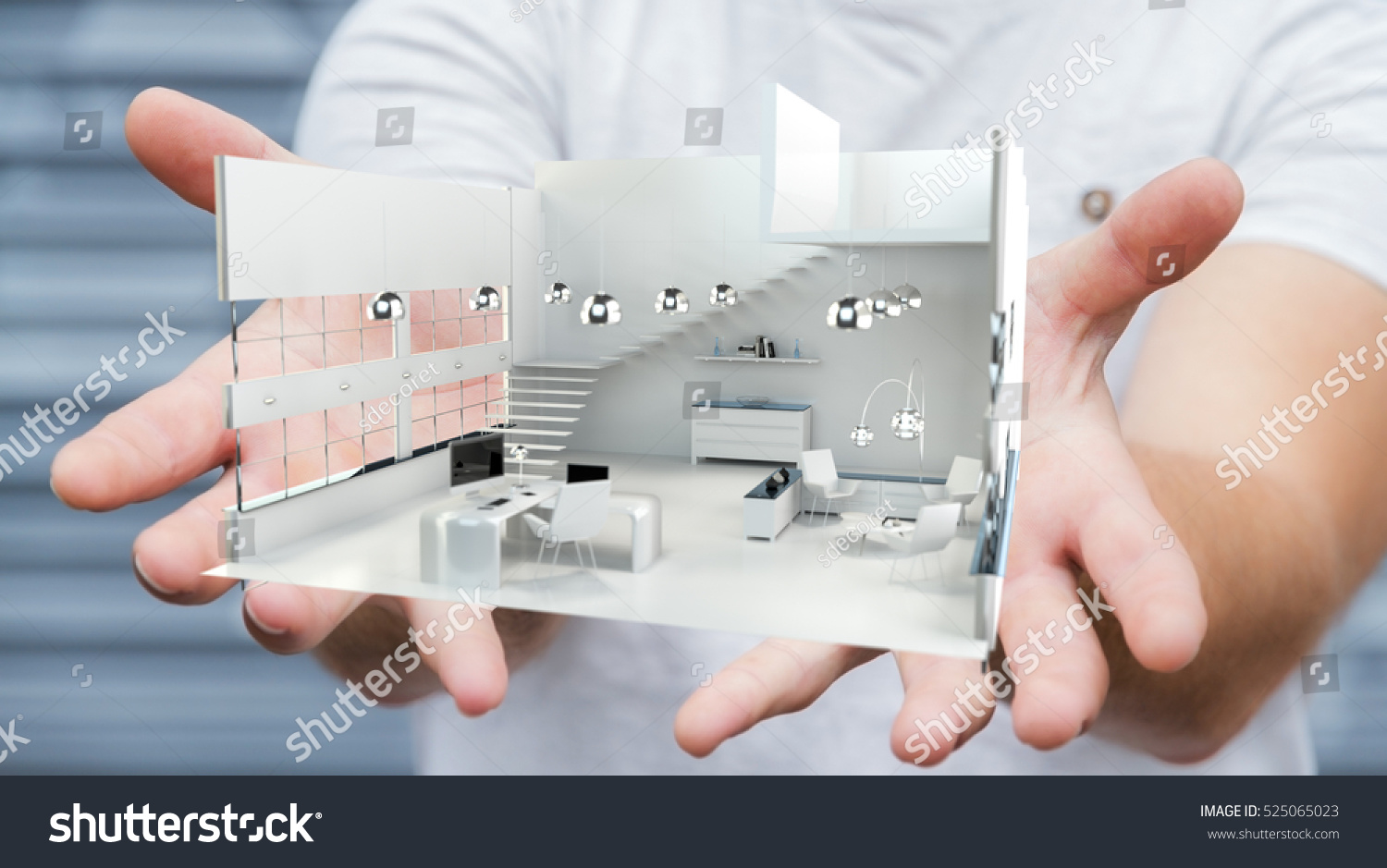 Businessman on blurred background holding white 3D rendering apartment in his hand #525065023