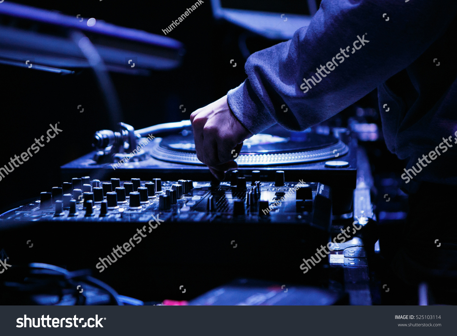 MOSCOW - 15 NOVEMBER,2016: Dj play music at hip hop party in club.Turntable vinyl record player,analog sound technology for disc jockey to scratch vinyl records,mix tracks #525103114
