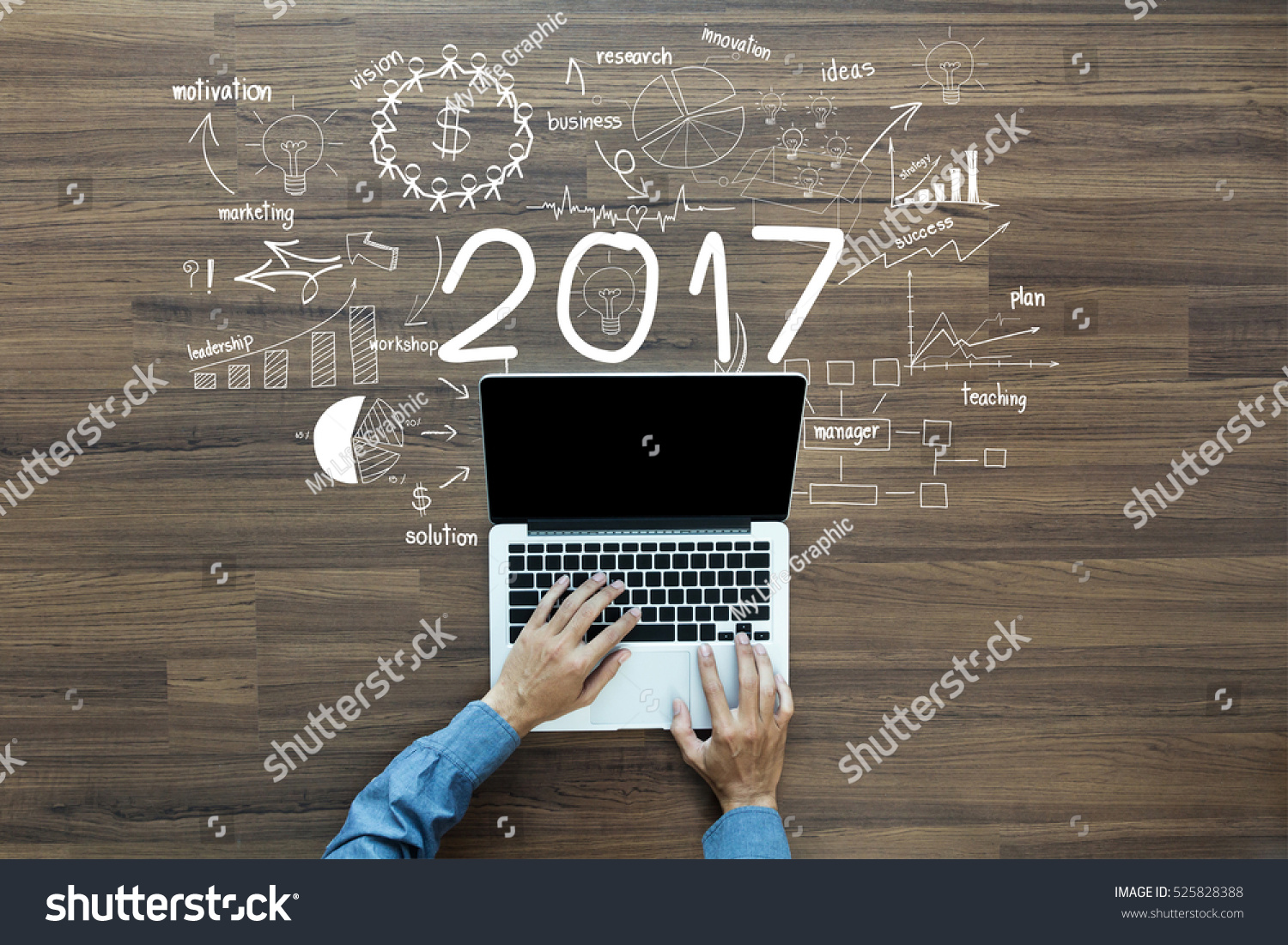 2017 new year business success, Creative thinking drawing charts and graphs strategy plan ideas wooden table background, Inspiration concept with businessman working on laptop computer PC, Top View #525828388