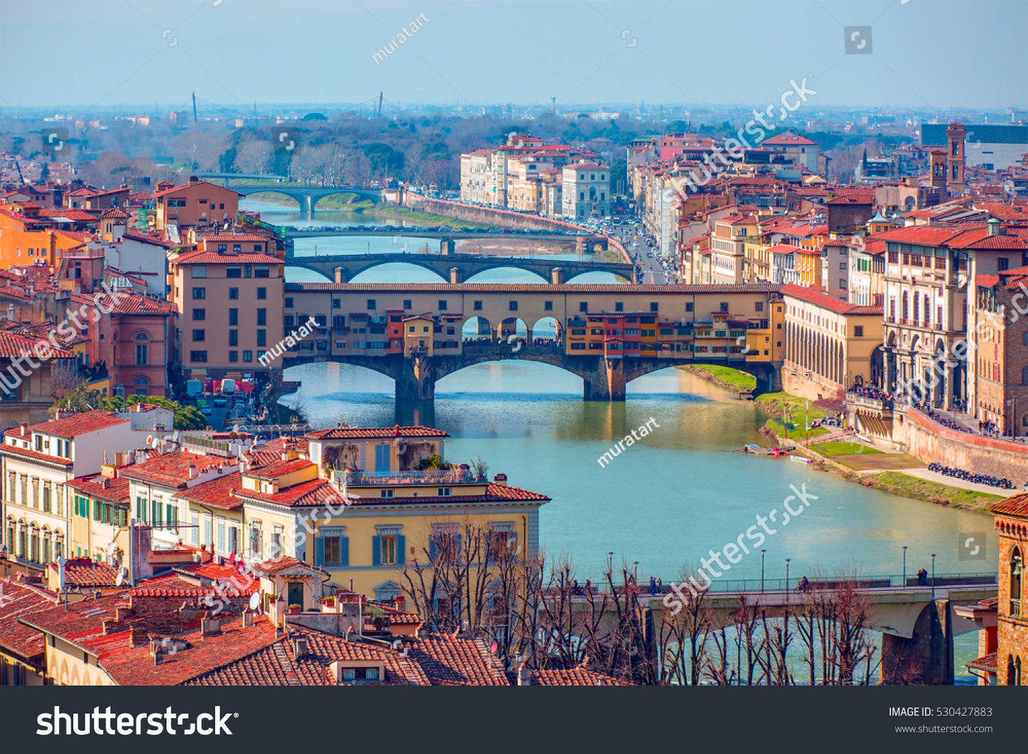 Panoramic view of Florence with  Ponte Vecchio over Arno river -  Florence, Italy #530427883
