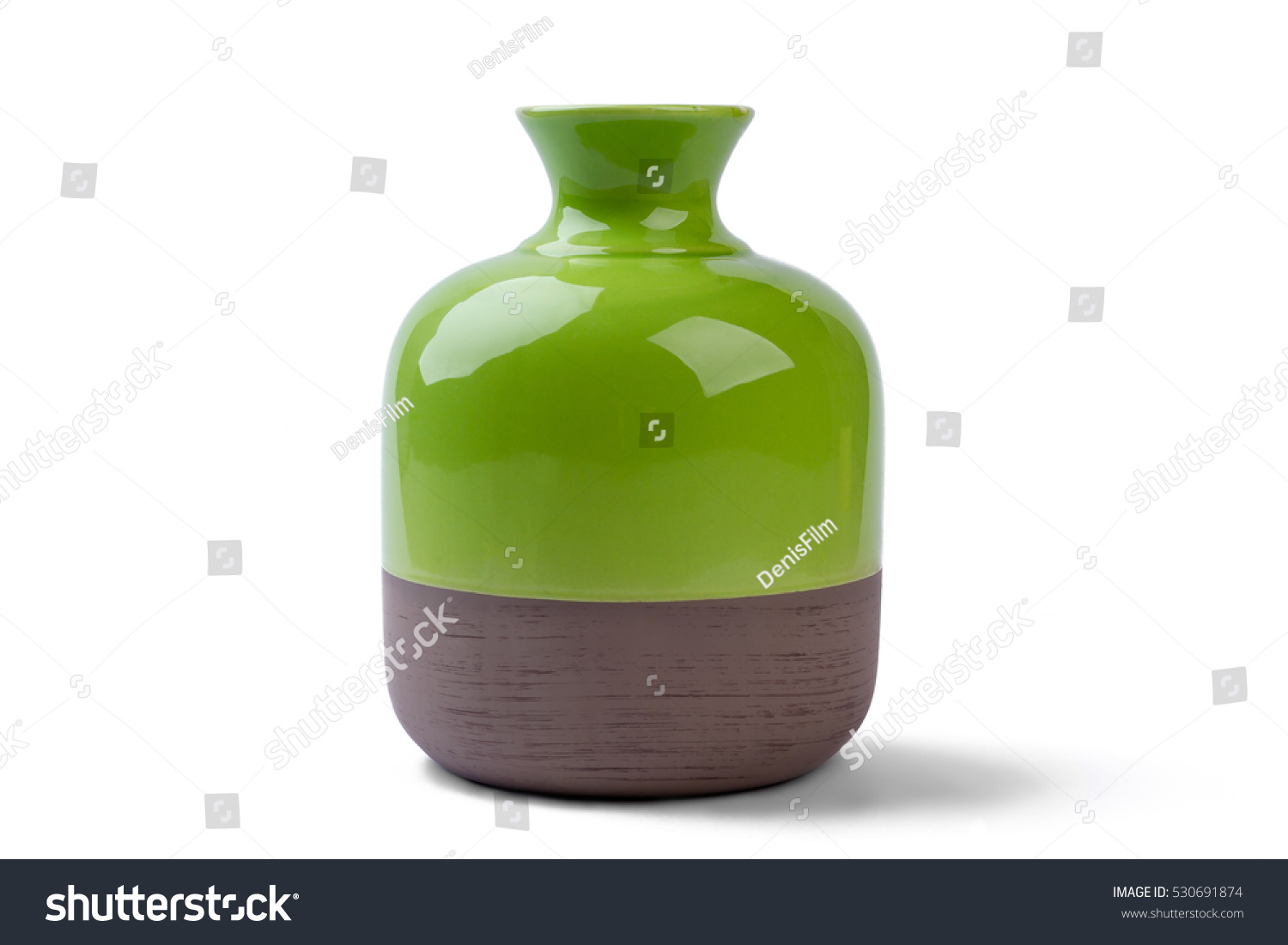 Two-tone vase isolated. Ceramic vase on white background. Decorate house with shiny vase. Best pottery for home. #530691874