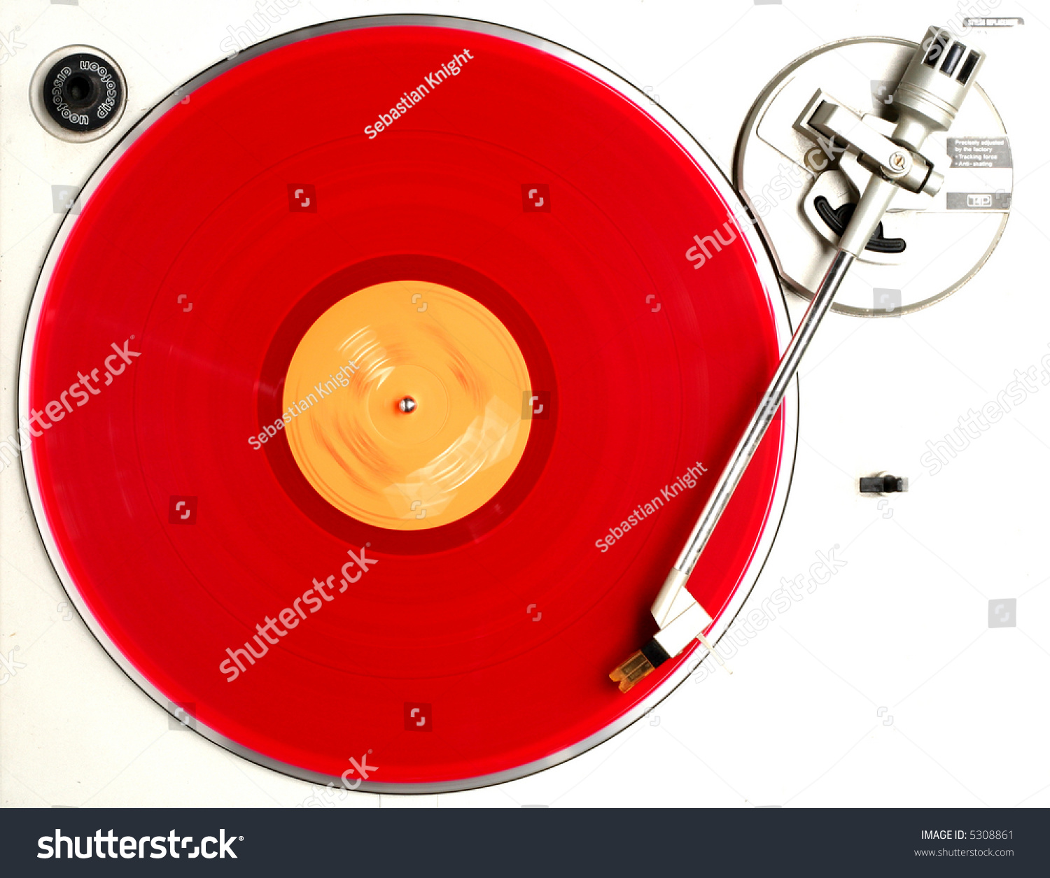 red album on turntable #5308861