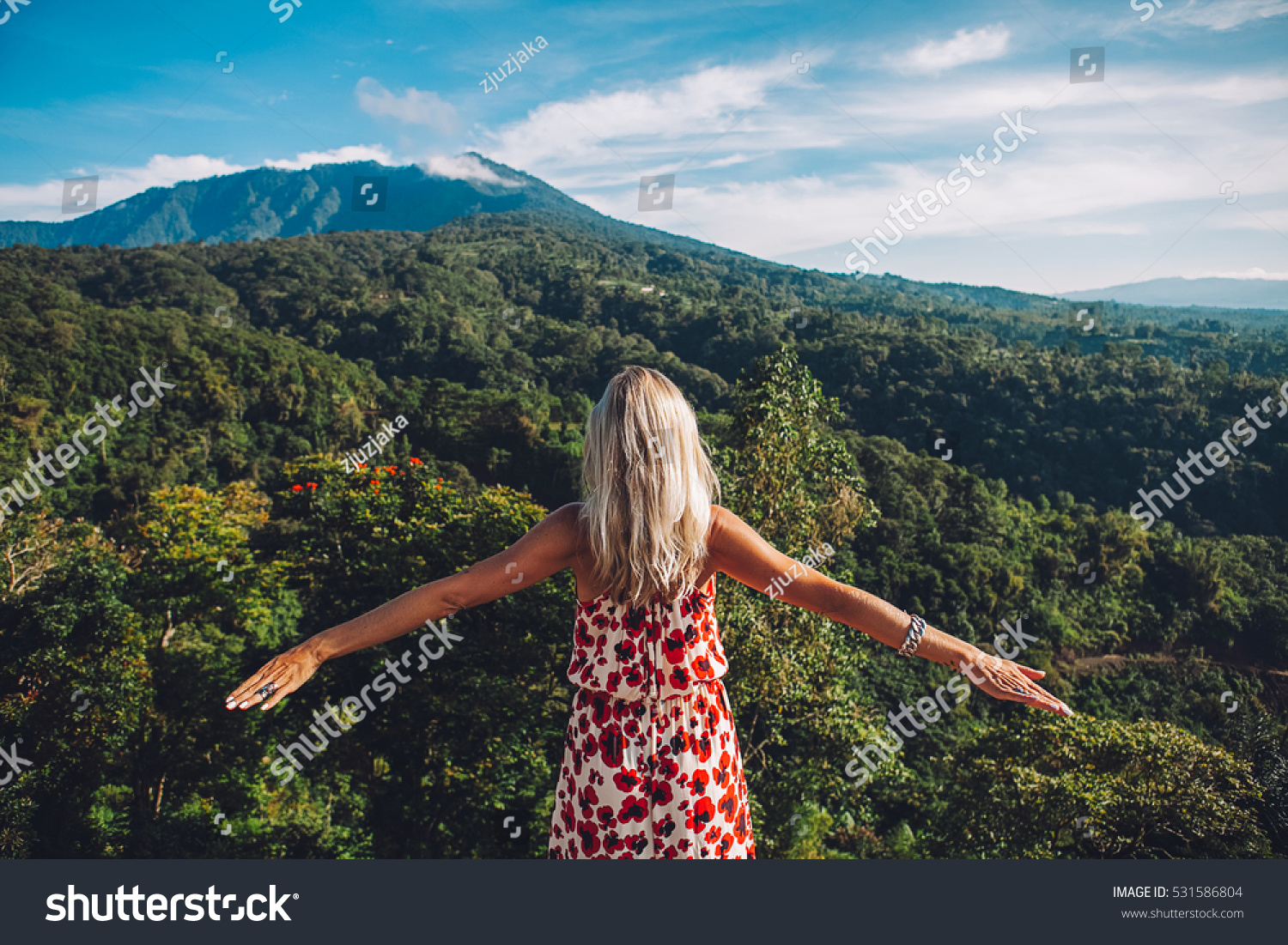 Young blonde caucasian woman traveling in the mountains, north of Bali, luxury vacation, explore and discover the world #531586804
