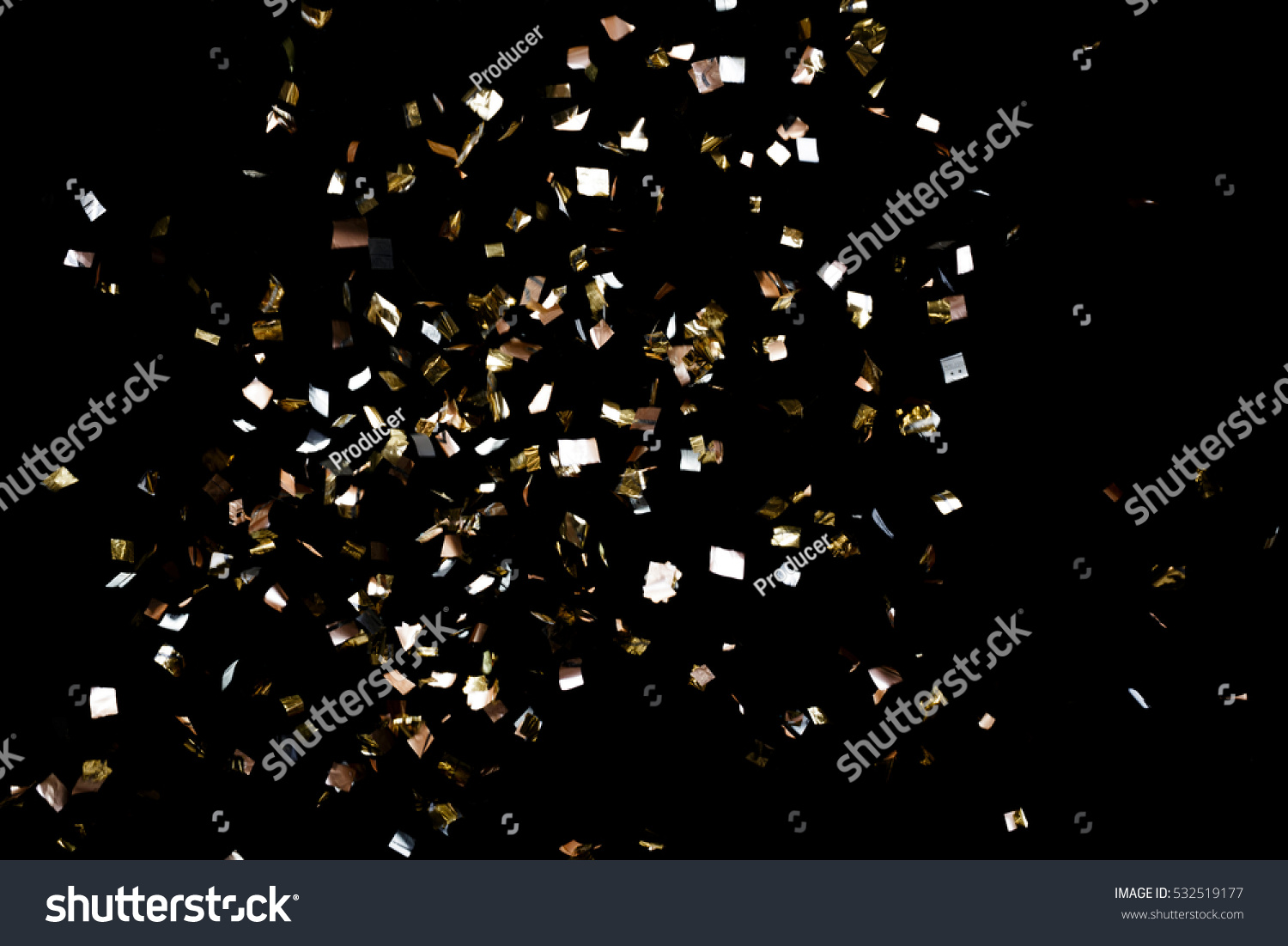 Golden confetti isolated on black background #532519177