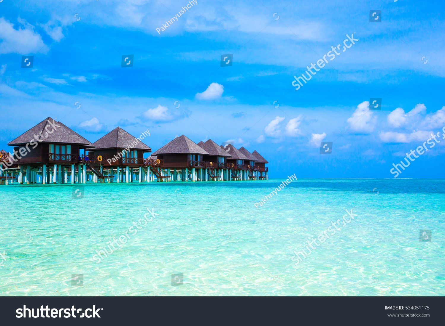 beach with water bungalows at Maldives #534051175