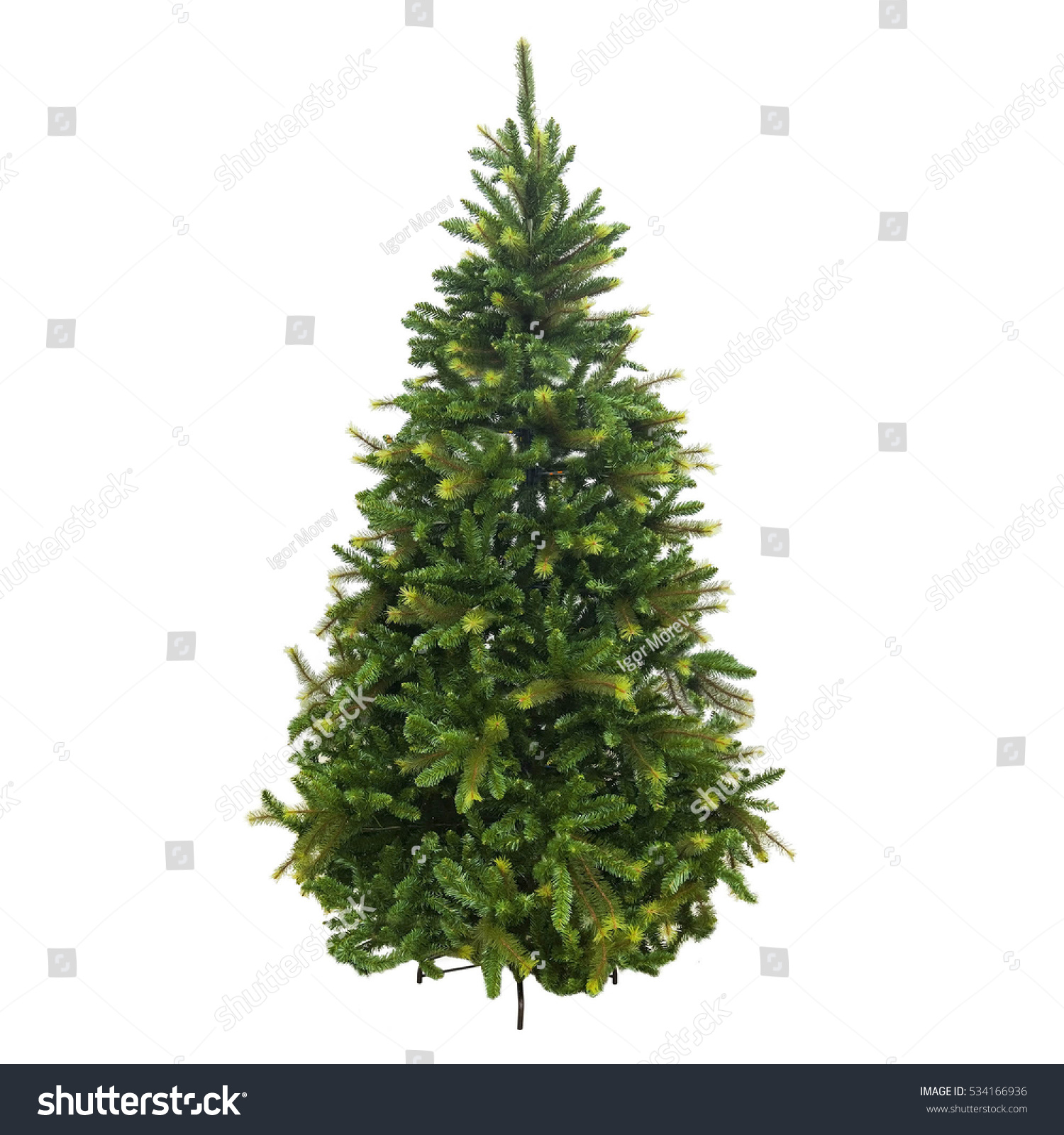 Christmas tree made of plastic on a pedestal not dressed artificial  #534166936