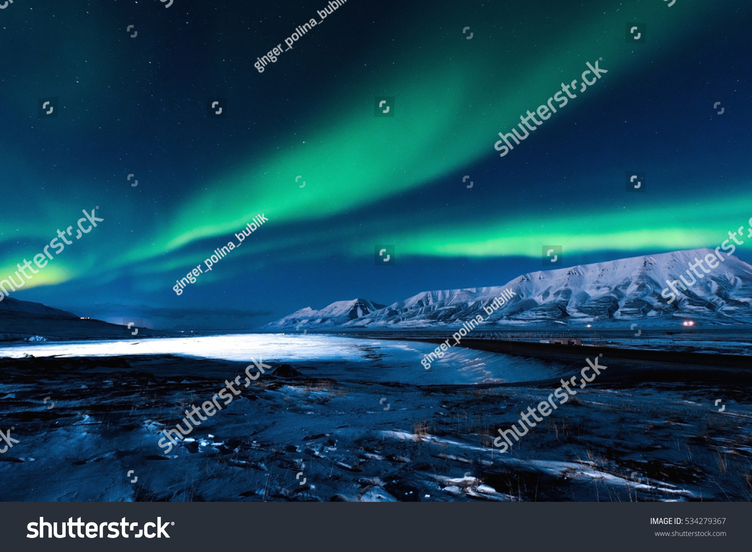 The polar Northern  lights in Norway Svalbard in the mountains #534279367