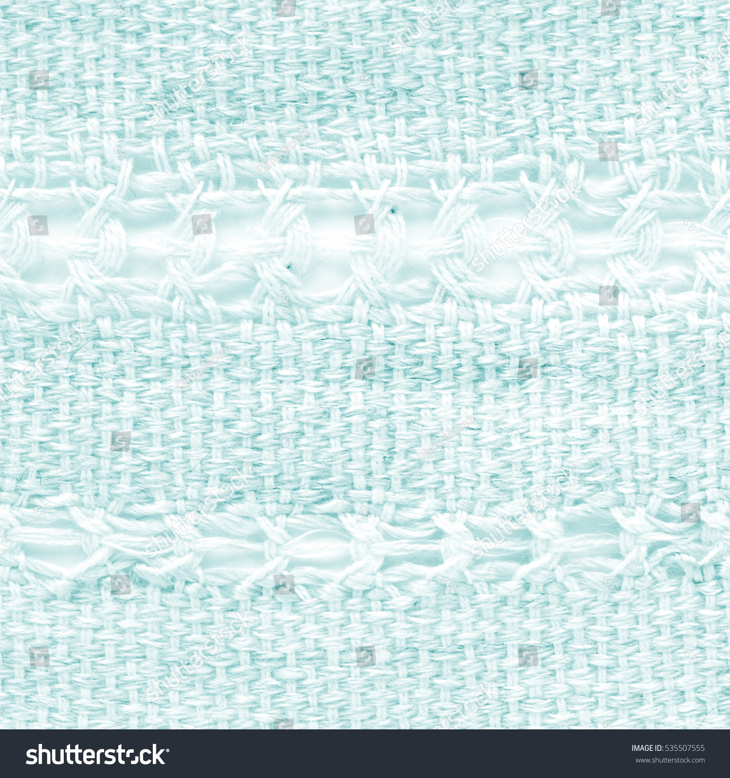 Turquoise hand weaving matting tweed fabric texture. Closeup square fragment  #535507555