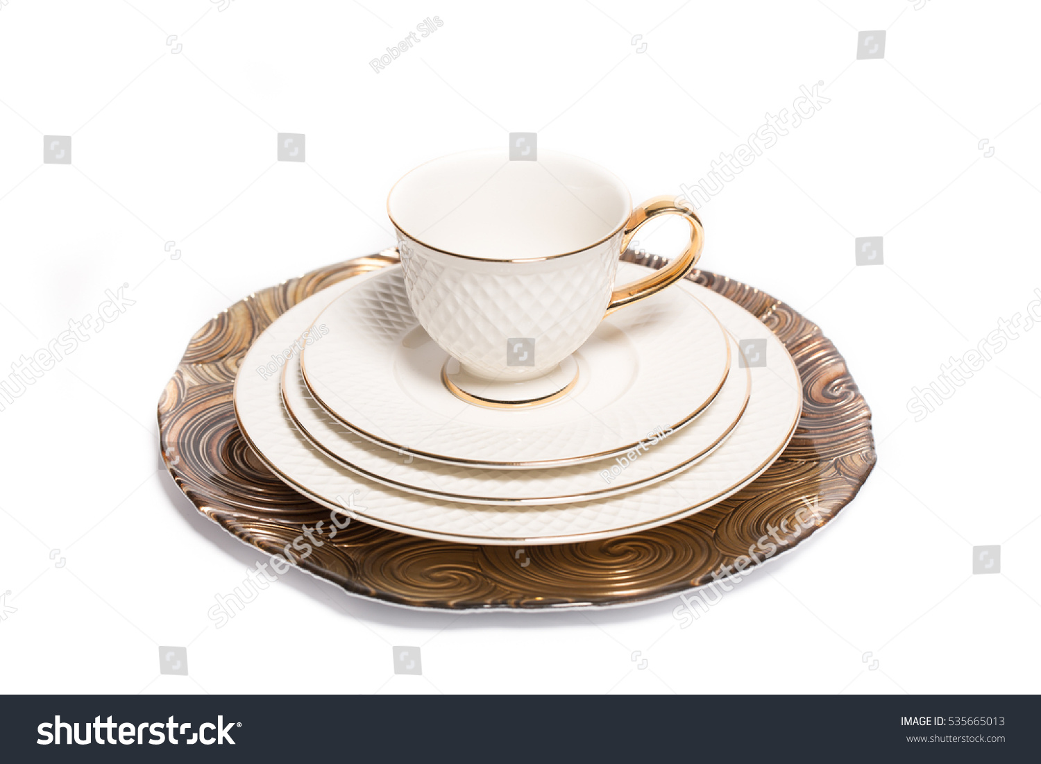 Vintage dishes and a cup isolated on white background #535665013