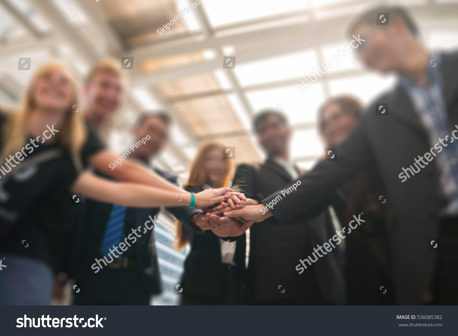 Group of Business People Join the Hand or United as Business  Group Teamwork Concept #536085382