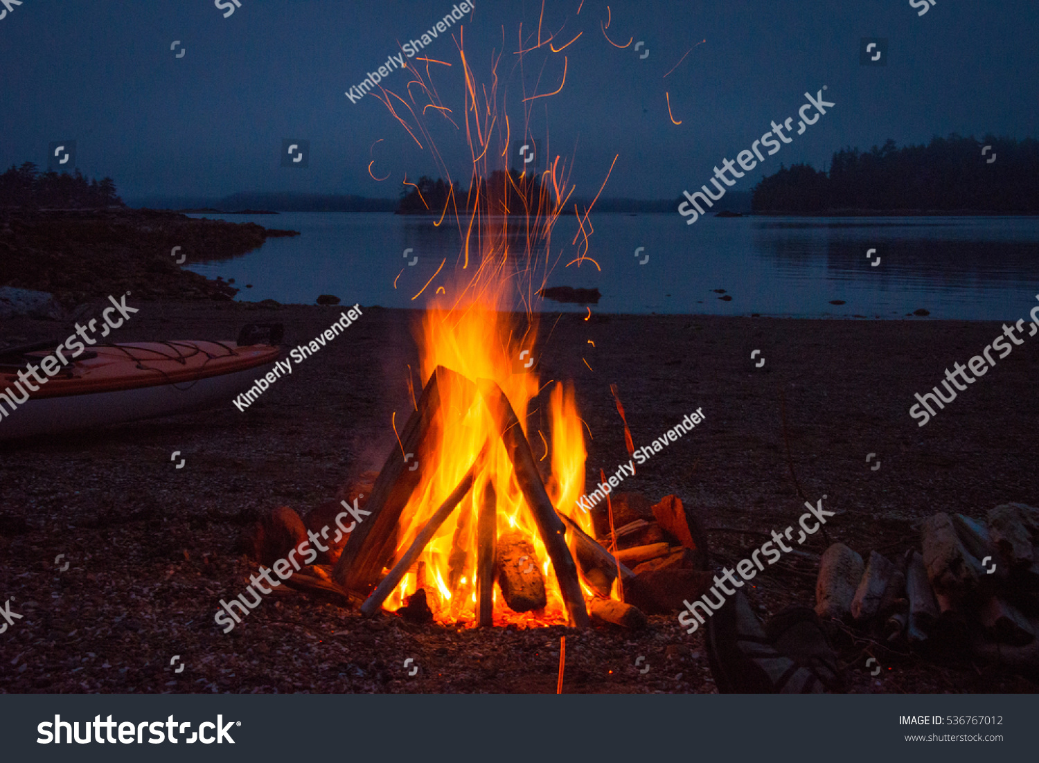 Campfire evening.  Kayak camping in the Broken Group Islands off the west coast of Vancouver Island. #536767012