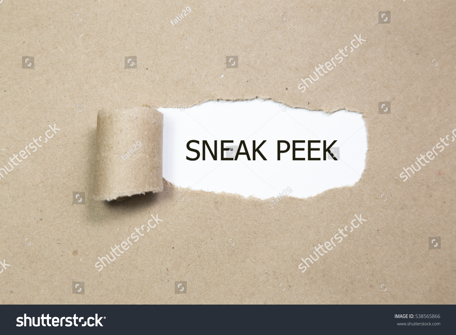 The phrase Sneak Peek appearing behind torn paper. #538565866