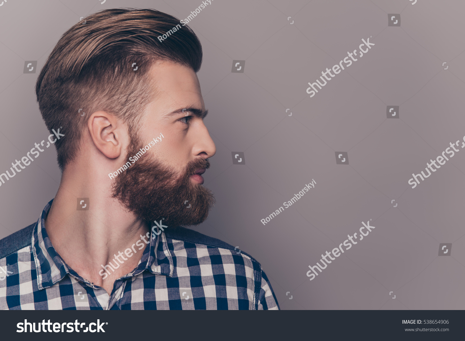 Side view portrait of thinking stylish young man looking away #538654906