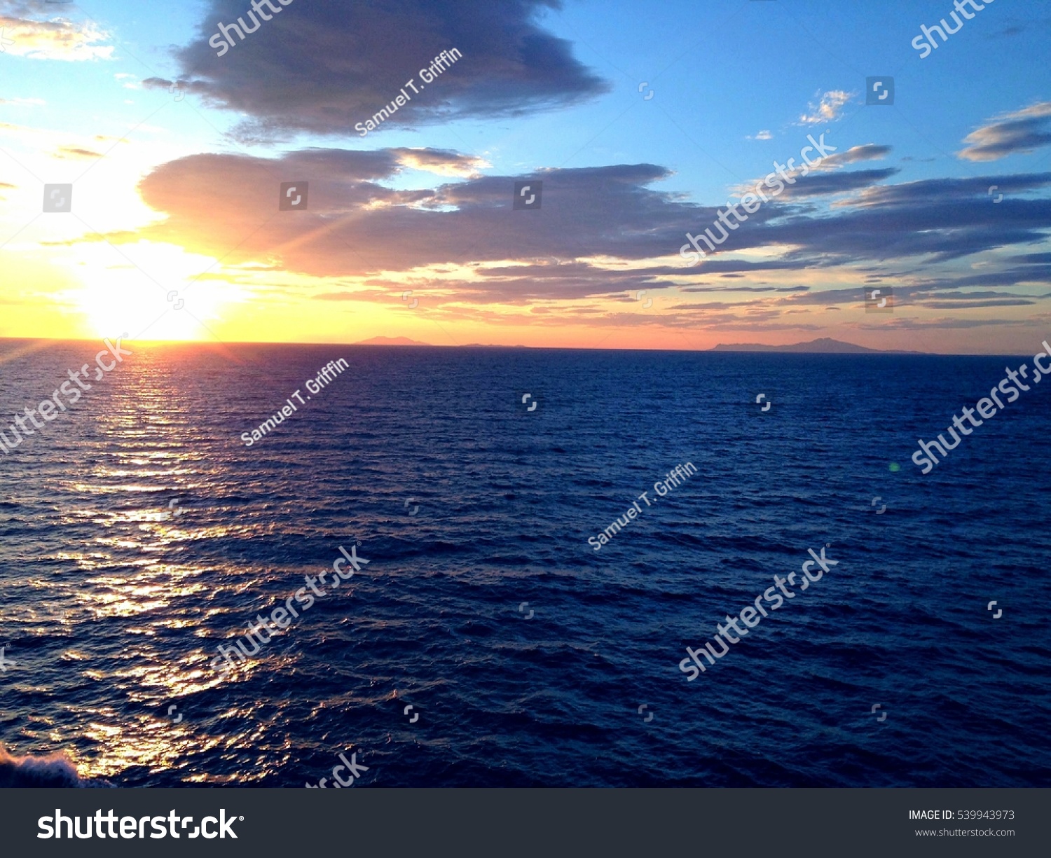 Sunset Over the Ocean #539943973