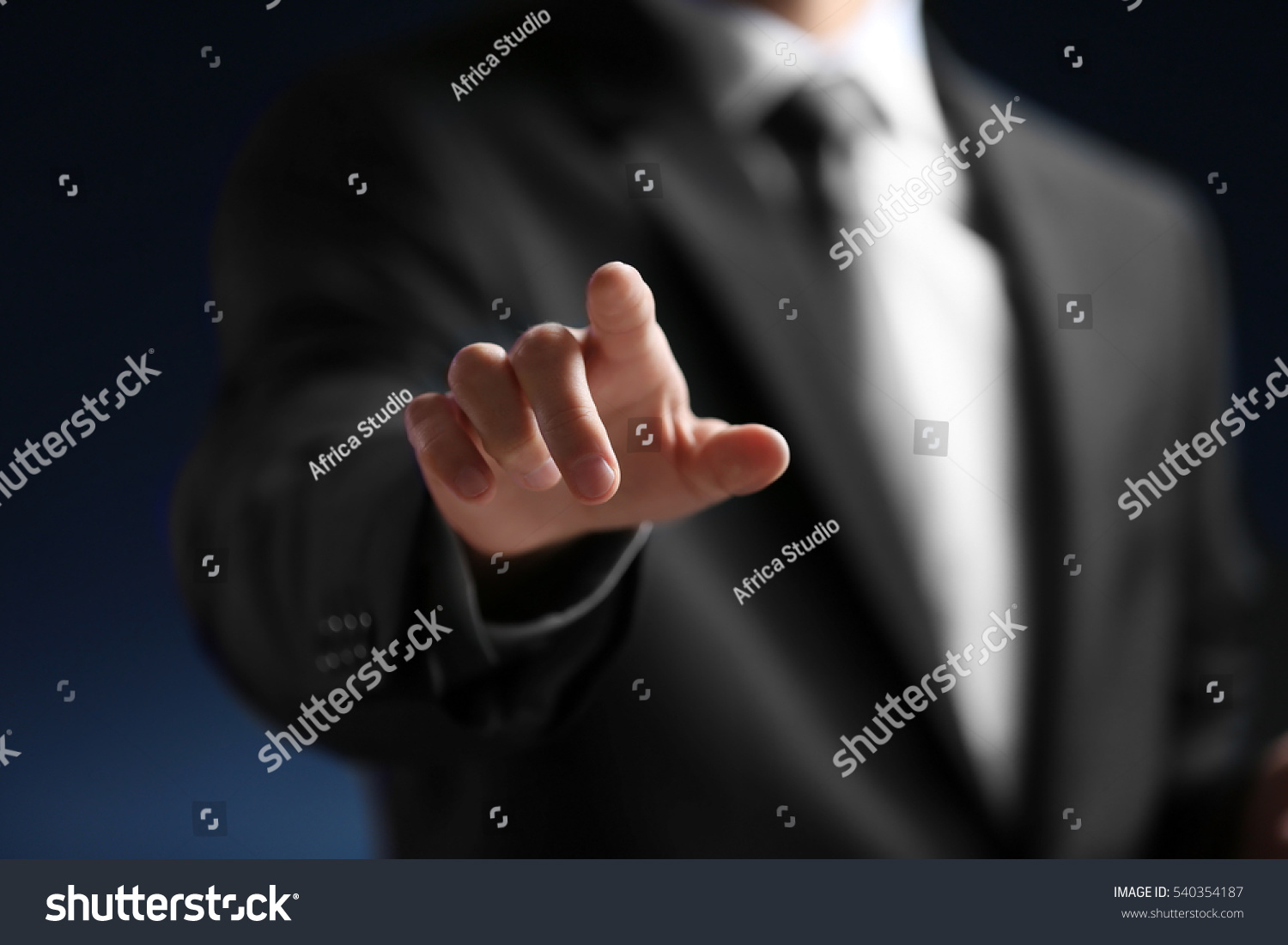 Businessman hand pointing, closeup #540354187