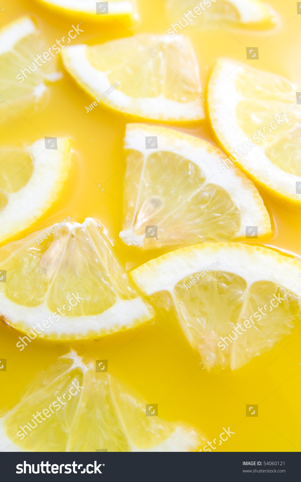 Sliced tasty lemons representing healthy lemon juice - lemonade. #54060121