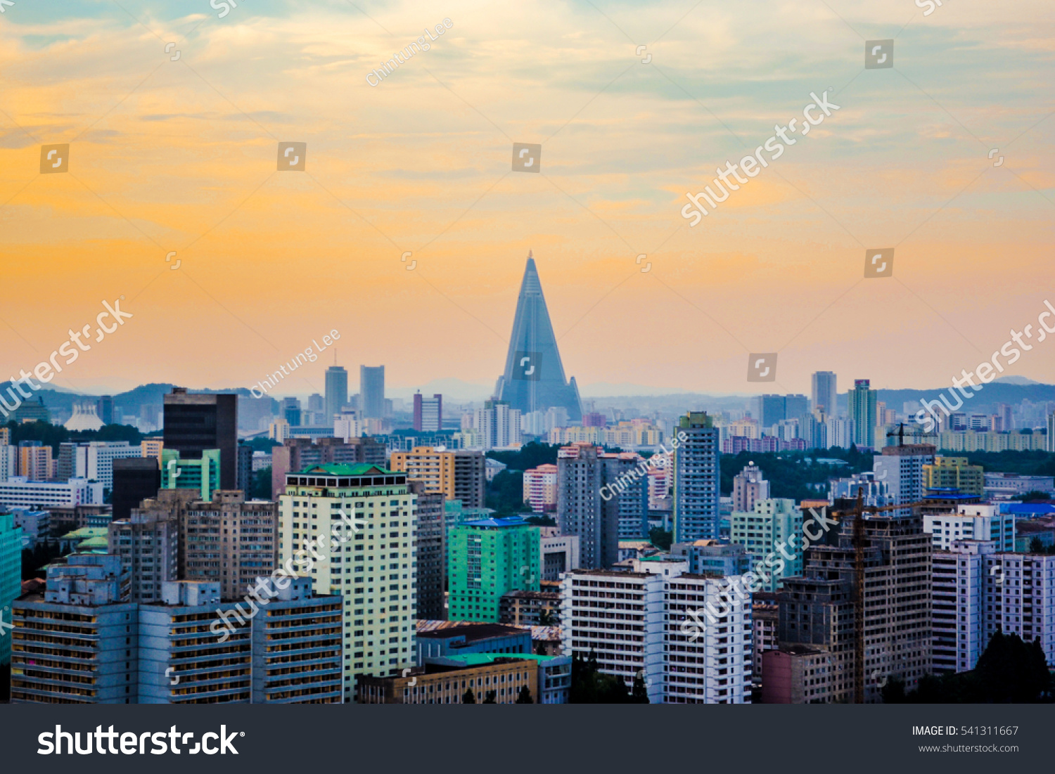 The skyline view of Ryugyong Hotel, an unfinished 105-story pyramid-shaped skyscraper & the first tall building in Pyongyang city, the capital of North Korea (DPRK) #541311667