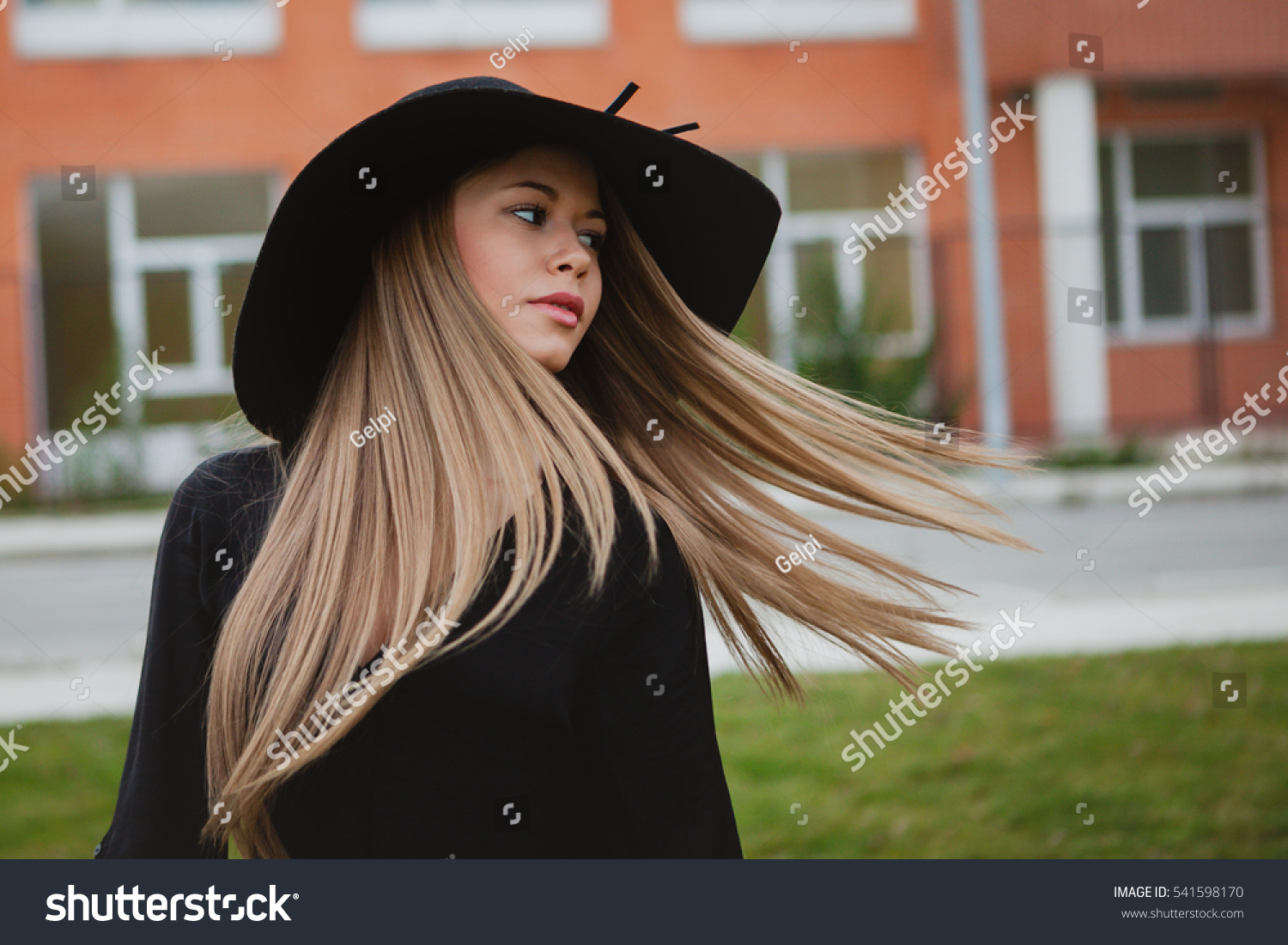 Portrait of a pretty girl wearing stylish hat  #541598170
