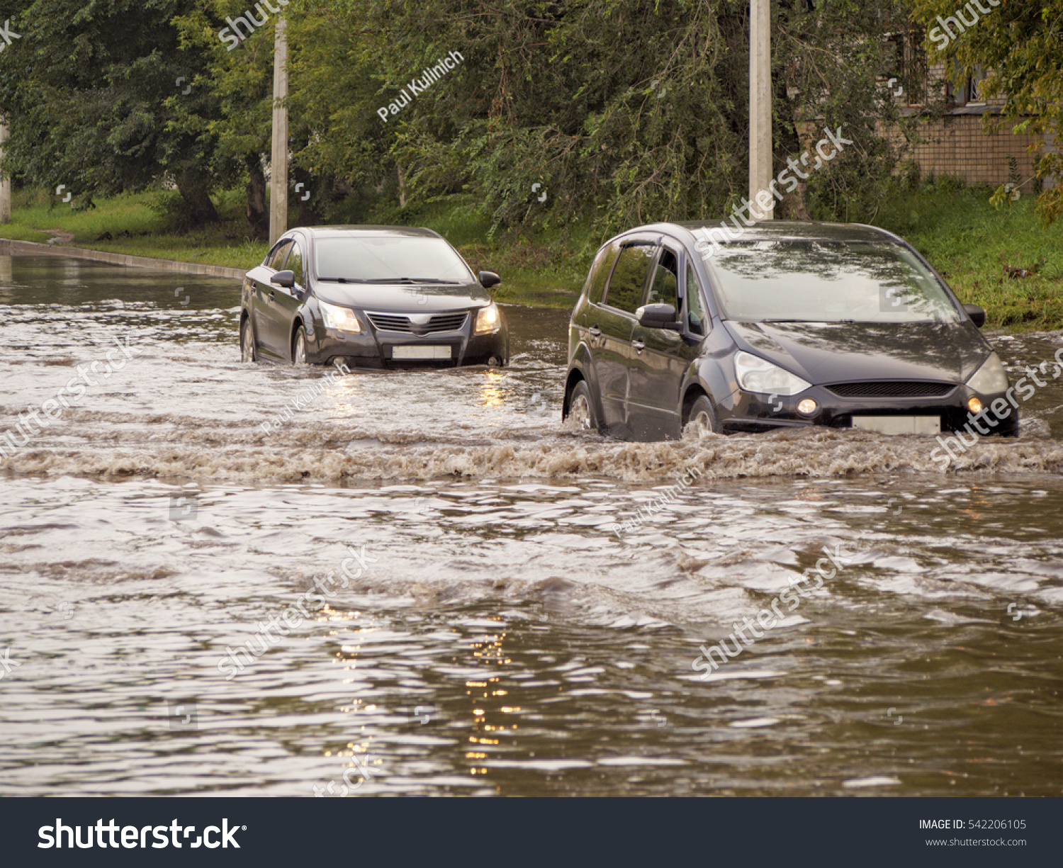 Cars on the street flooded with rain #542206105