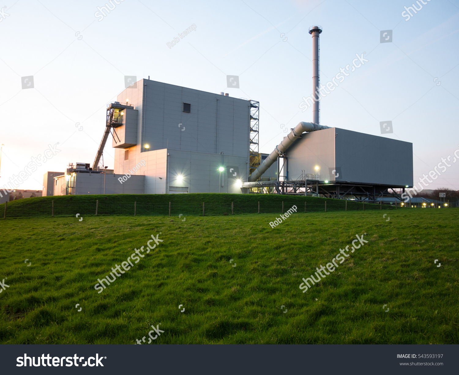 biomass power station at dusk #543593197